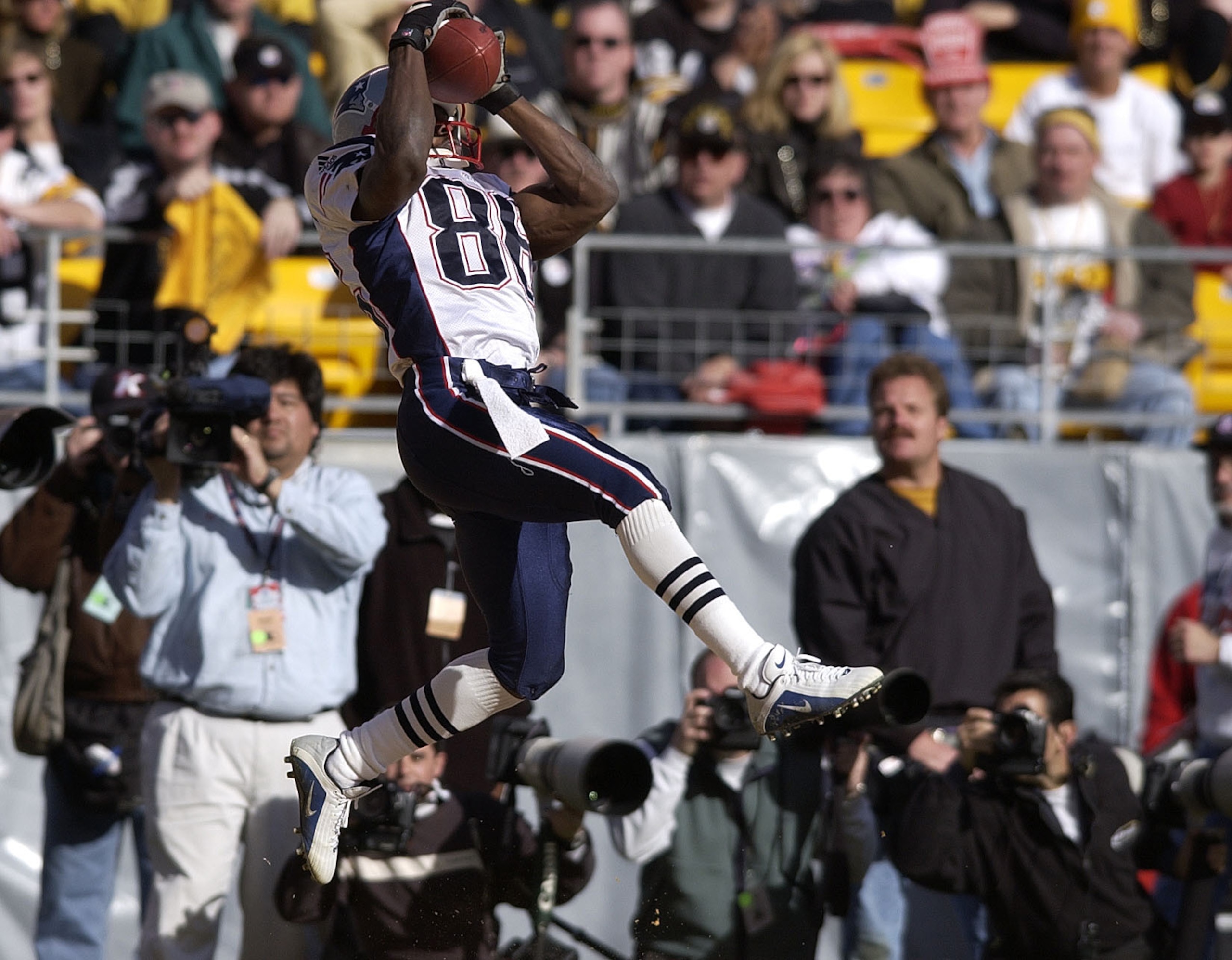 27 Jan 2002:  David Patten #86 of the New England Patriots catches a pass in the endzone to give the Patriots a 14-3 lead during the first half of the AFC  Championship Game between the Pittsburgh Steelers and the New England Patriots at Heinz Field in Pi