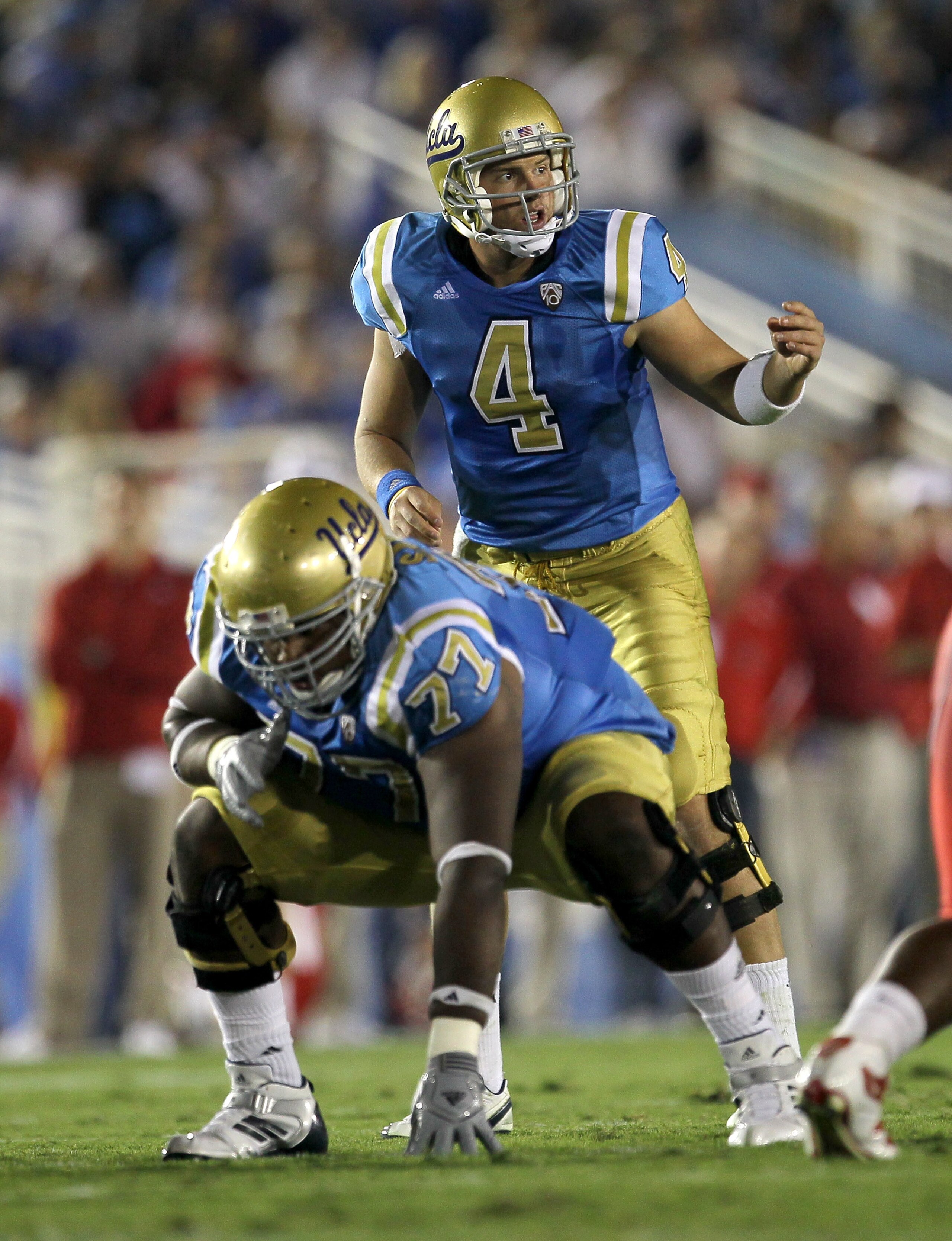 PASADENA, CA - SEPTEMBER 18:  Quarterback Kevin Prince #4 of the UCLA Bruins callis signals in the game against the Houston Cougars at the Rose Bowl on September 18, 2010 in Pasadena, California.  (Photo by Stephen Dunn/Getty Images)