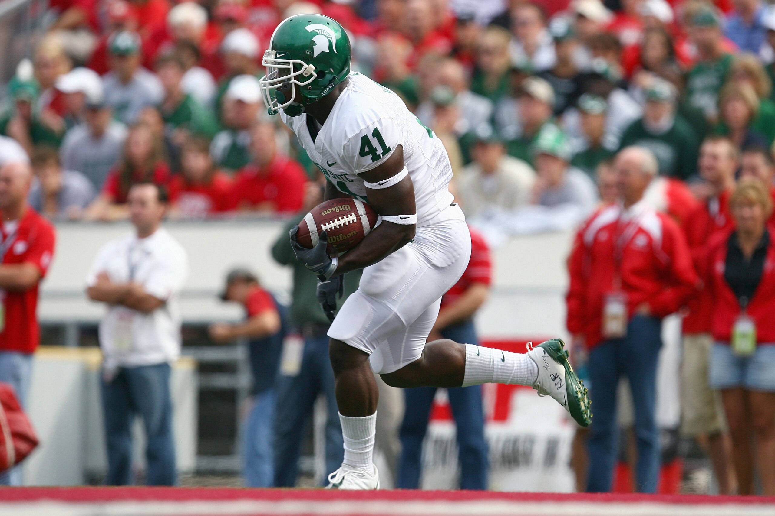 MADISON, WI - SEPTEMBER 26: Glenn Winston #31 of the Michigan State Spartans carries the ball against the Wisconsin Badgers on September 26, 2009 at Camp Randall Stadium in Madison, Wisconsin. (Photo by Jonathan Daniel/Getty Images)