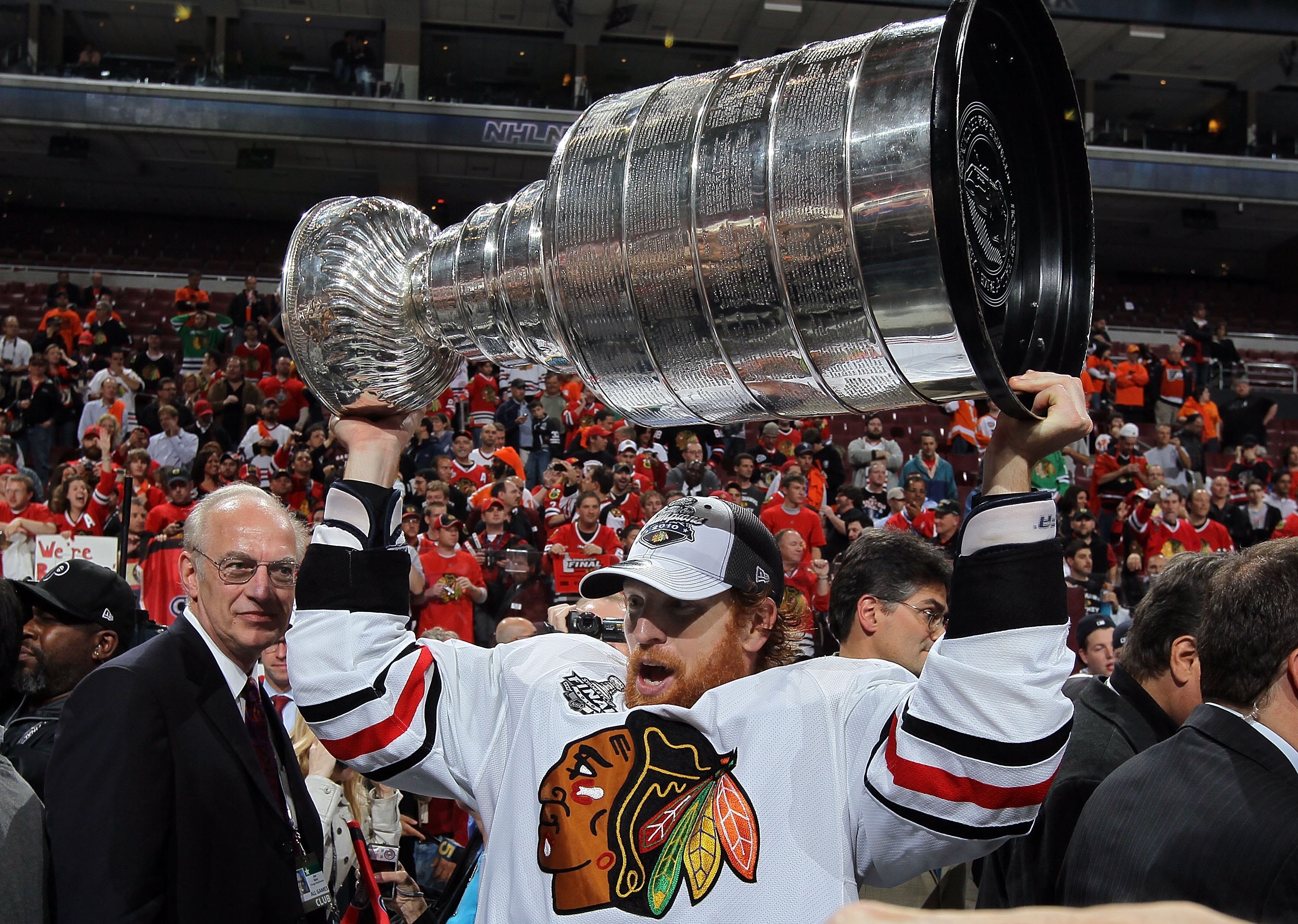 PHILADELPHIA - JUNE 09:  Brian Campbell #51 of the Chicago Blackhawks hoists the Stanley Cup after teammate Patrick Kane scored the game-winning goal in overtime to defeat the Philadelphia Flyers 4-3 and win the Stanley Cup in Game Six of the 2010 NHL Sta