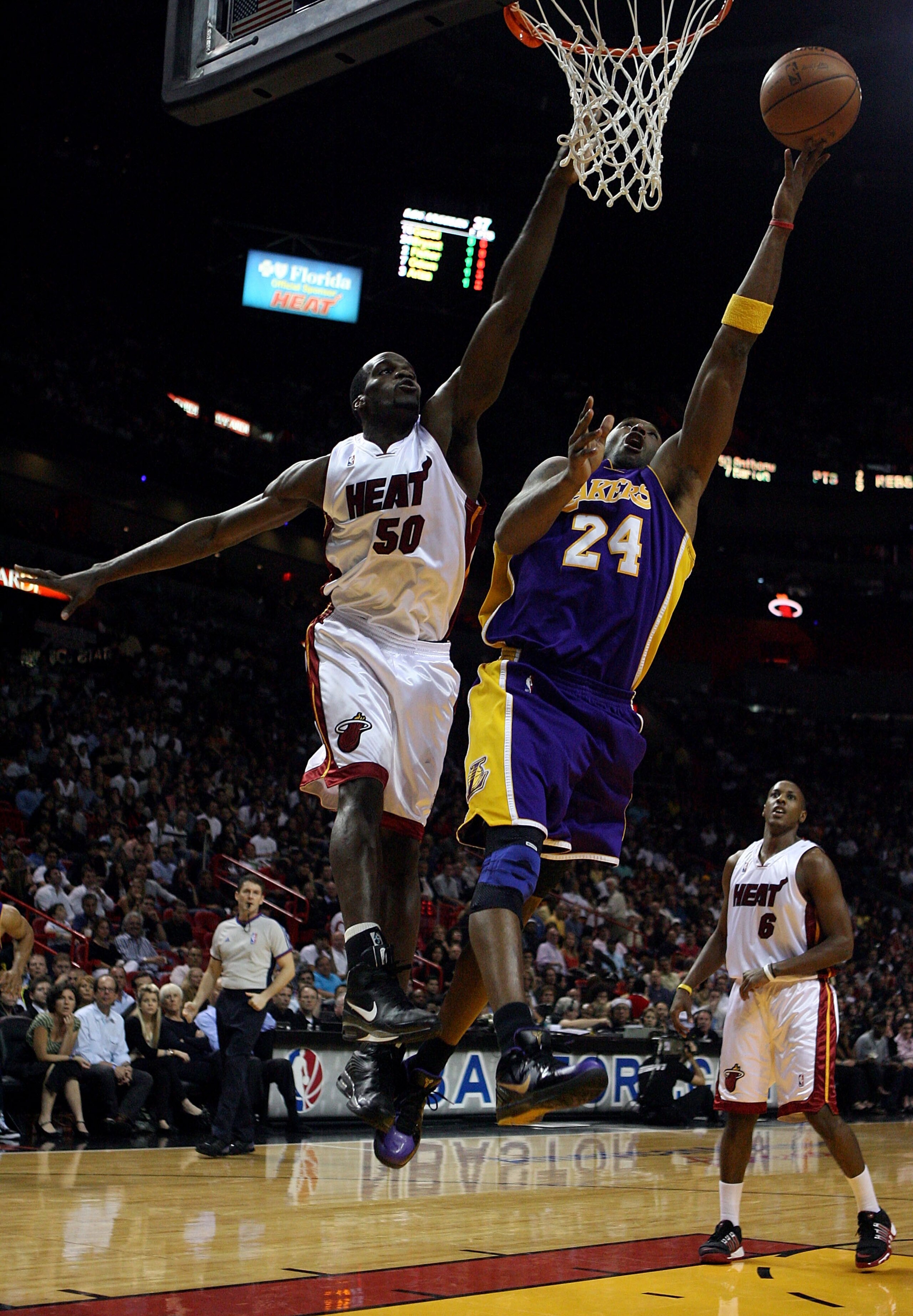 MIAMI - DECEMBER 19:  Kobe Bryant #24 of the Los Angeles Lakers scores over Joel Anthony #50 of the Miami Heat at American Airlines Arena on December 19, 2008 in Miami, Florida. NOTE TO USER: User expressly acknowledges and agrees that, by downloading and