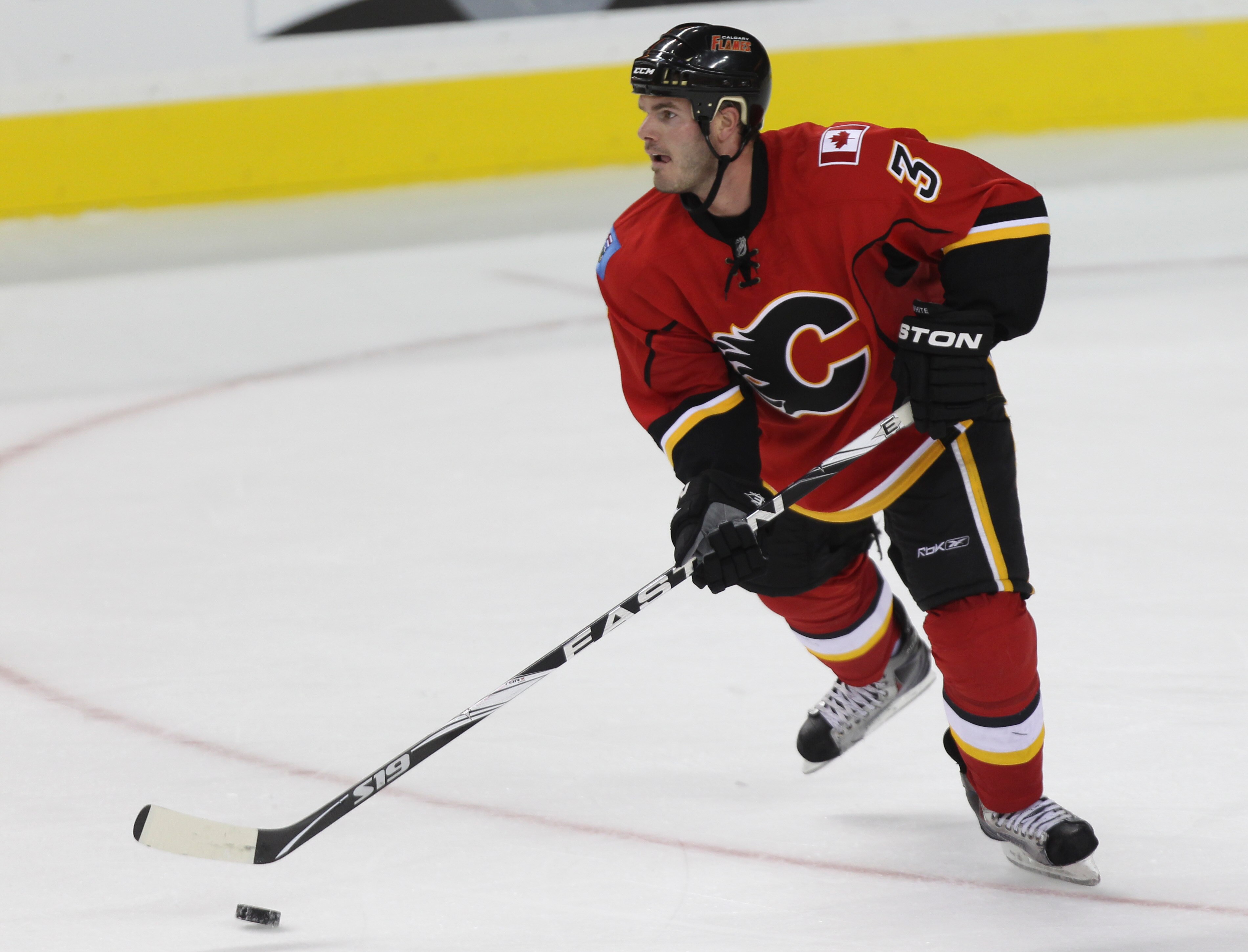 CALGARY, AB - SEPTEMBER 28: Ian White #3 of the Calgary Flames plays against the Phoenix Coyotes in NHL preseason action on September 28, 2010 at the Pengrowth Saddledome in Calgary, Alberta, Canada. (Photo by Mike Ridewood/Getty Images)