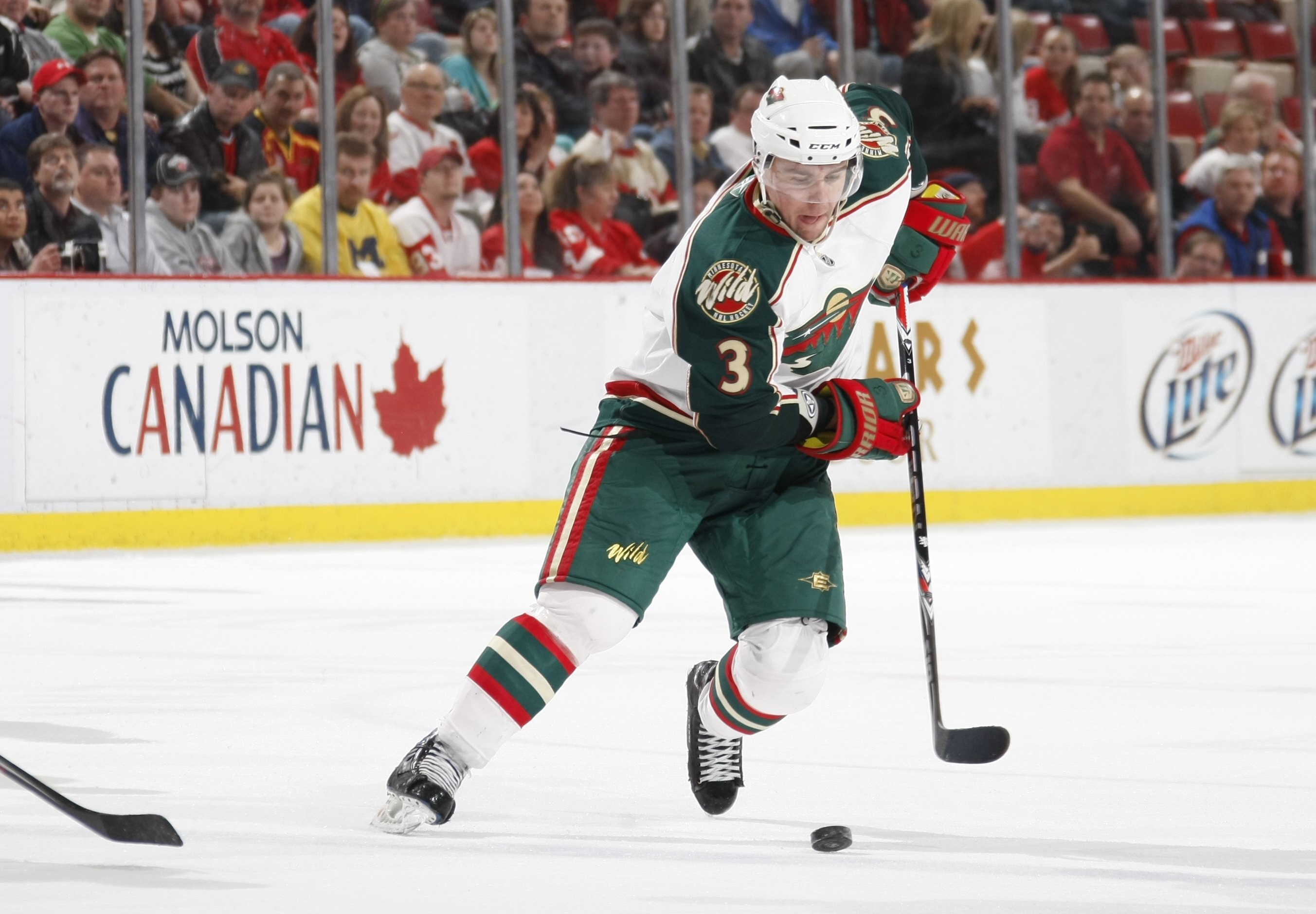 DETROIT - MARCH 11:  Marek Zidlicky #3 of the Minnesota Wild skates with the puck against the Detroit Red Wings during their NHL game on March 11, 2010 at Joe Louis Arena in Detroit, Michigan. (Photo by Gregory Shamus/Getty Images)