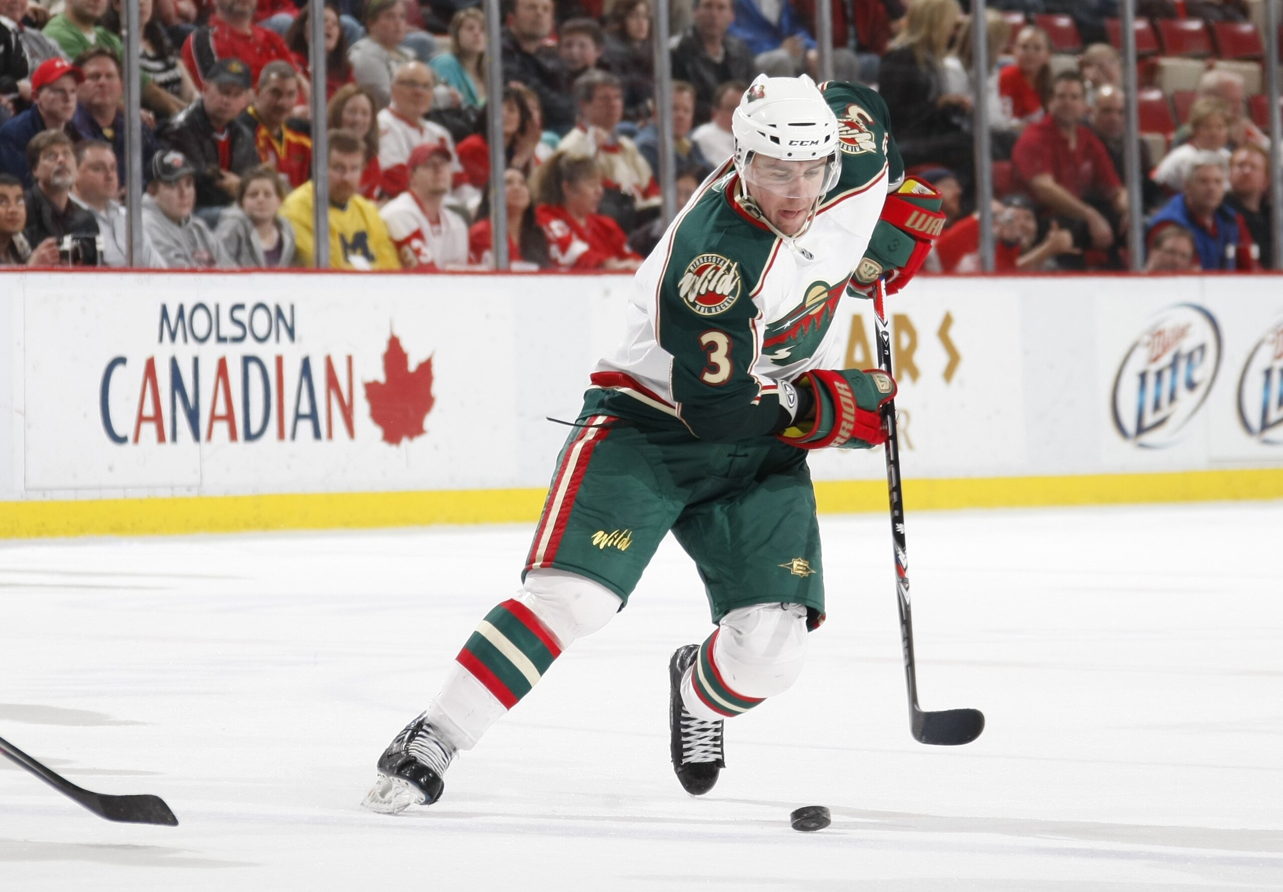 DETROIT - MARCH 11:  Marek Zidlicky #3 of the Minnesota Wild skates with the puck against the Detroit Red Wings during their NHL game on March 11, 2010 at Joe Louis Arena in Detroit, Michigan. (Photo by Gregory Shamus/Getty Images)