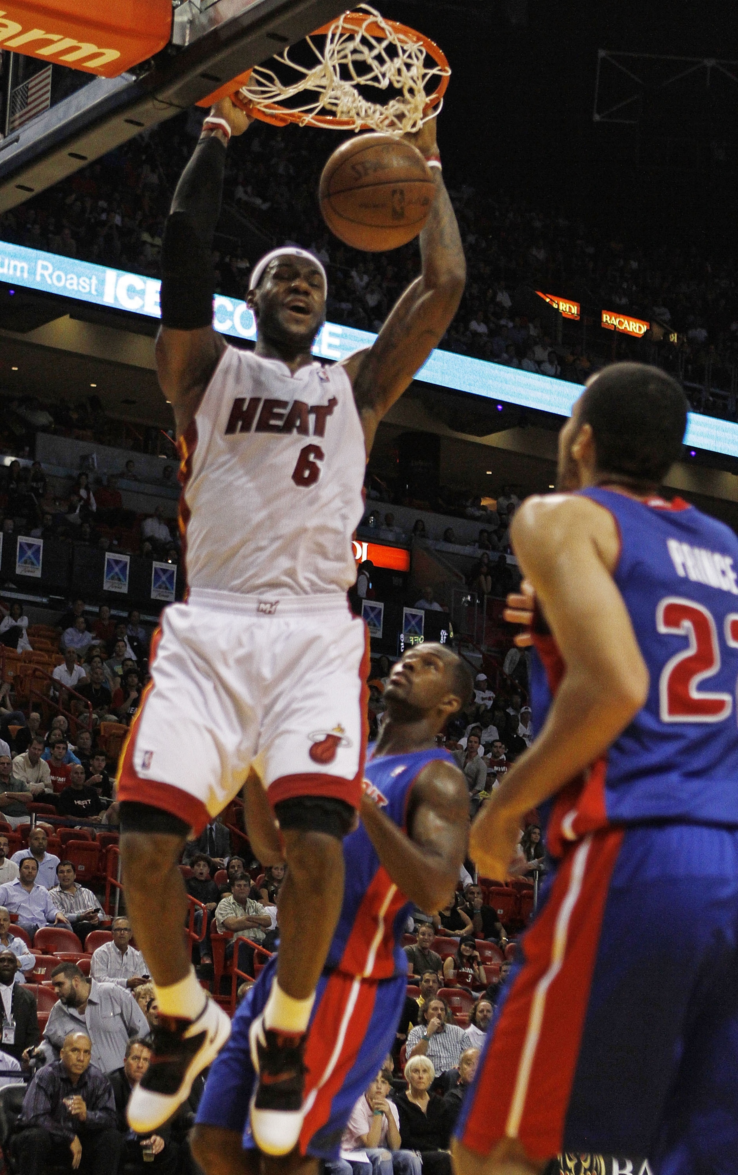 MIAMI - OCTOBER 05: Forward LeBron James #6 of the Miami Heat dunks against the Detroit Pistons on October 5, 2010 in Miami, Florida. NOTE TO USER: User expressly acknowledges and agrees that, by downloading and or using this photograph, User is consen MIAMI - OCTOBER 05: Forward LeBron James #6 of the Miami Heat dunks against the Detroit Pistons on October 5, 2010 in Miami, Florida. NOTE TO USER: User expressly acknowledges and agrees that, by downloading and or using this photograph, User is consen