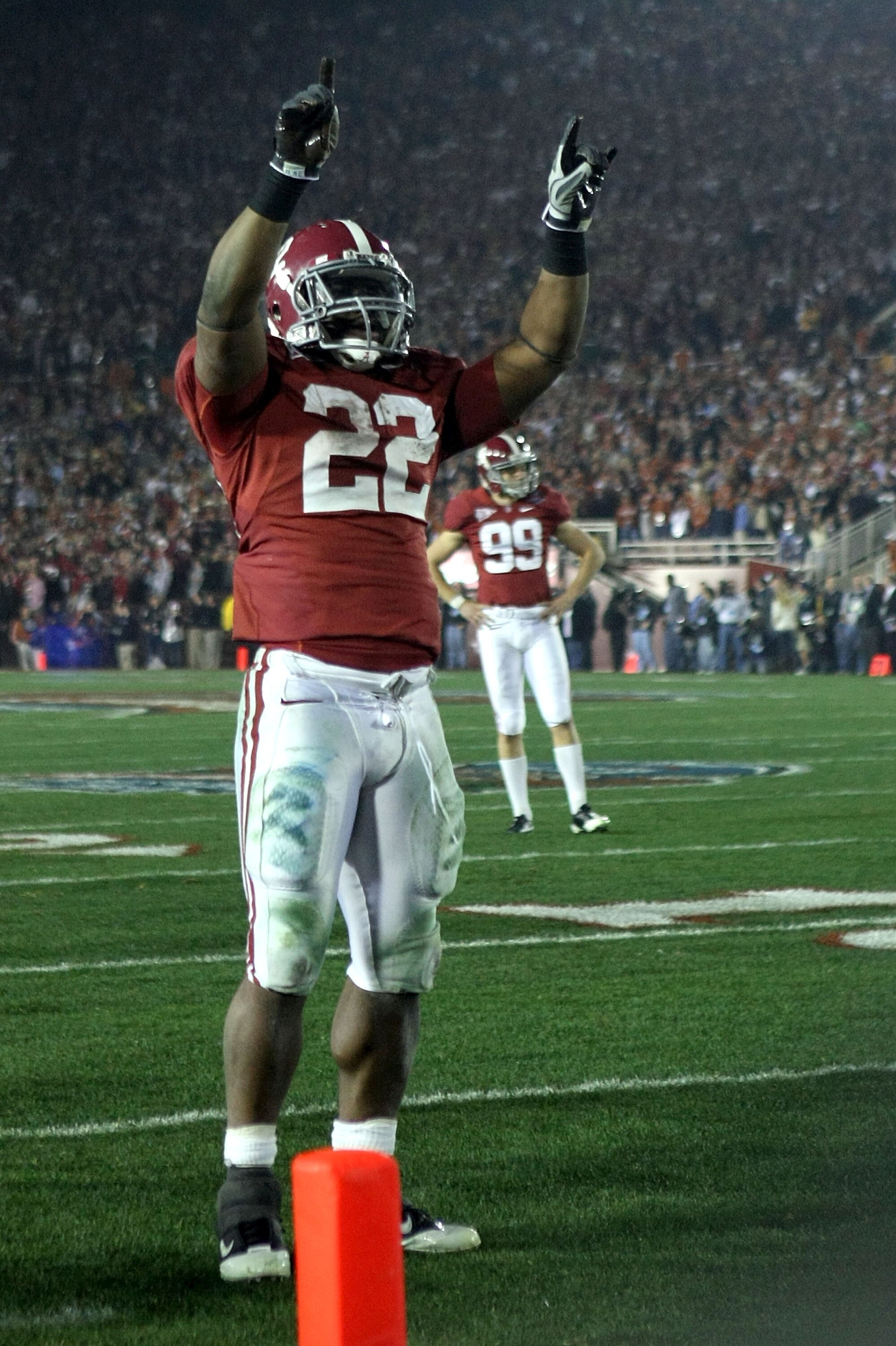PASADENA, CA - JANUARY 07:  Running back Mark Ingram #22 of the Alabama Crimson Tide celebrates after an extra point during the Citi BCS National Championship game against the Texas Longhorns at the Rose Bowl on January 7, 2010 in Pasadena, California. Th