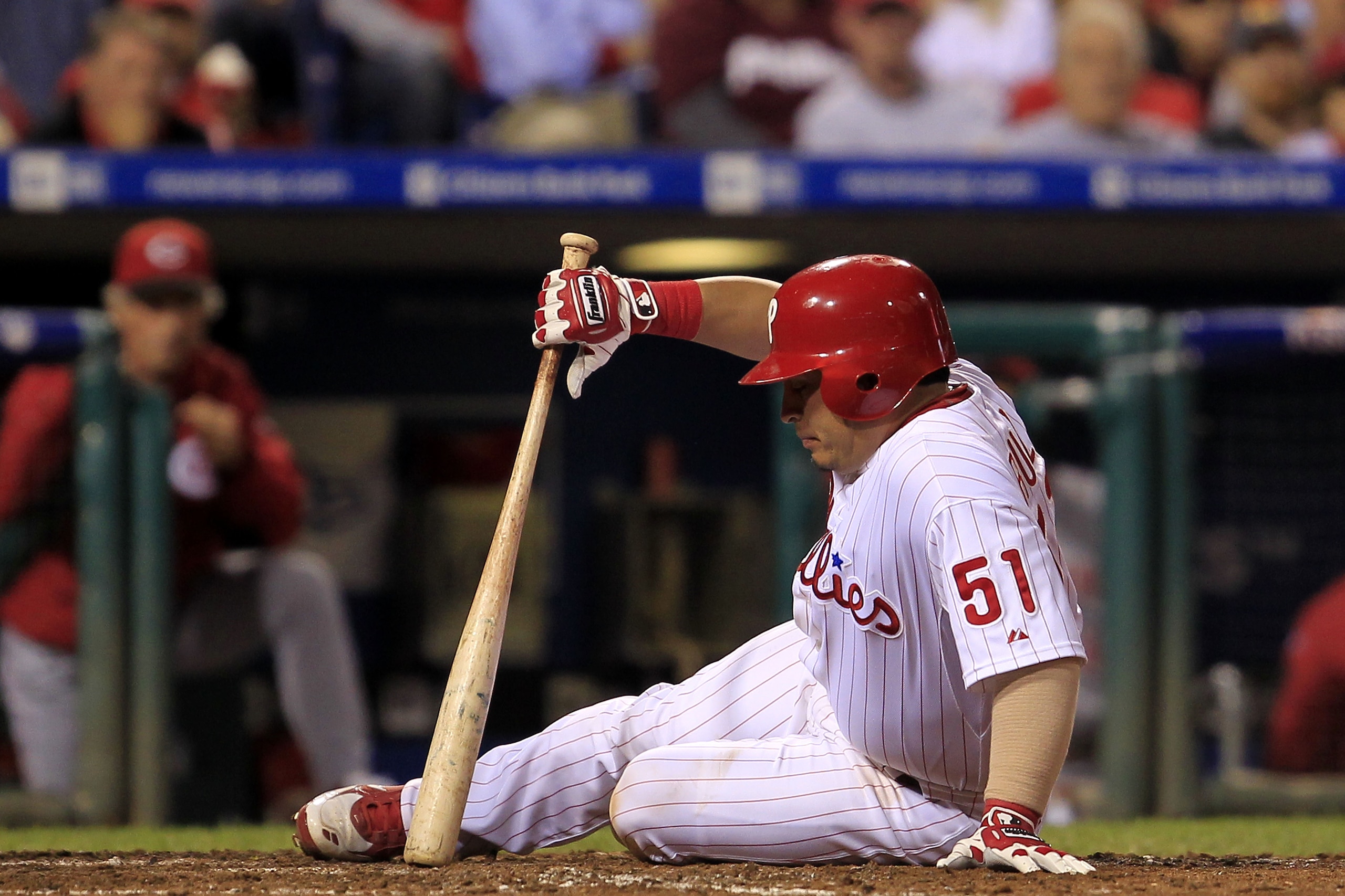 PHILADELPHIA - OCTOBER 08: Carlos Ruiz #51 of the Philadelphia Phillies is hit by a pitch in the sixth inning durig the game against the Cincinnati Reds in game 2 of NLDS at Citizens Bank Park on October 8, 2010 in Philadelphia, Pennsylvania. The Phillies