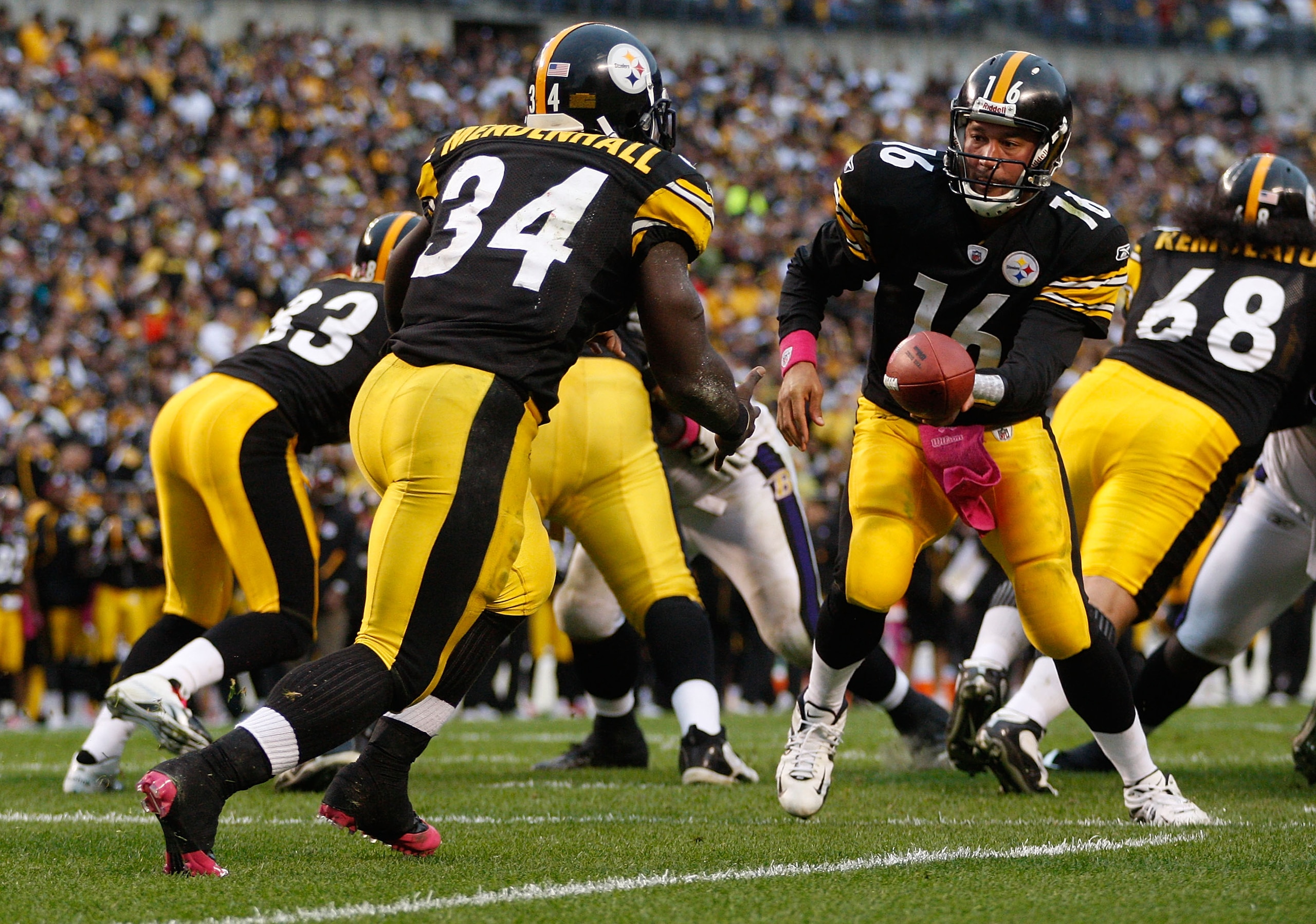 PITTSBURGH - OCTOBER 03:  Charlie Batch #16 of the Pittsburgh Steelers hands the ball off to Rashard Mendenhall #34 during the game against the Baltimore Ravens on October 3, 2010 at Heinz Field in Pittsburgh, Pennsylvania.  (Photo by Jared Wickerham/Gett