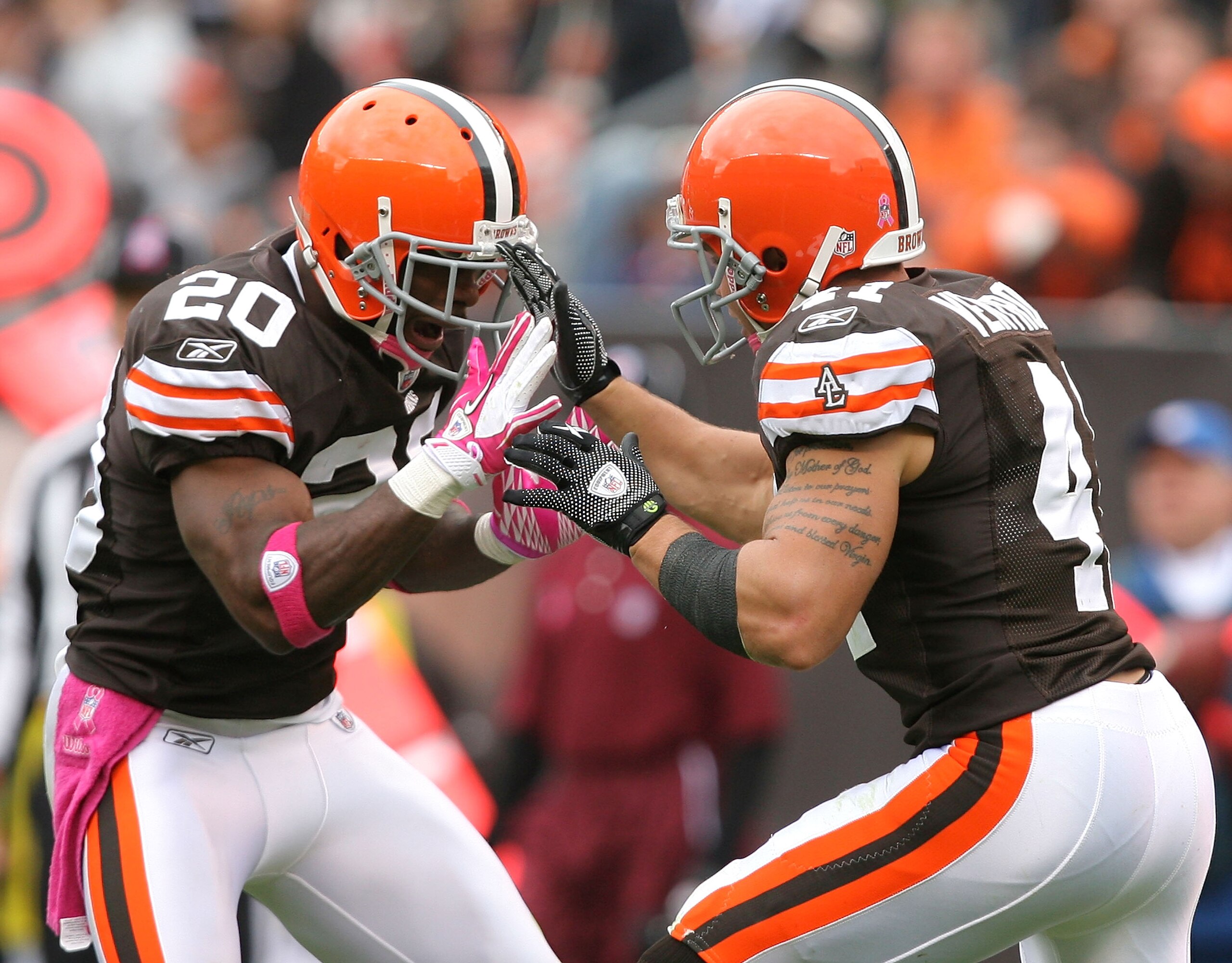 CLEVELAND - OCTOBER 03:  Defensive back Mike Adams #20 and Ray Ventrone #41 of the Cleveland Browns celebrate after a play against the Cincinnati Bengals at Cleveland Browns Stadium on October 3, 2010 in Cleveland, Ohio.  (Photo by Matt Sullivan/Getty Ima