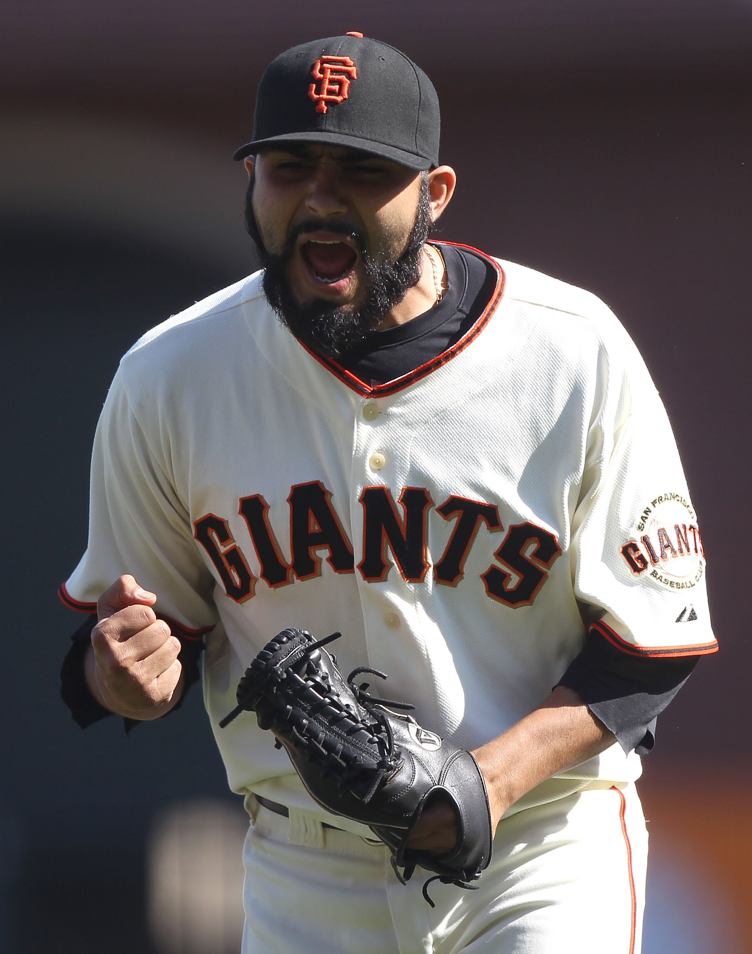 SAN FRANCISCO - SEPTEMBER 30:  Sergio Romo #54 of the San Francisco Giants celebrates after striking out Miguel Montero of the Arizona Diamondbacks in the eighth innng during a Major League Baseball game at AT&T Park on September 30, 2010 in San Francisco