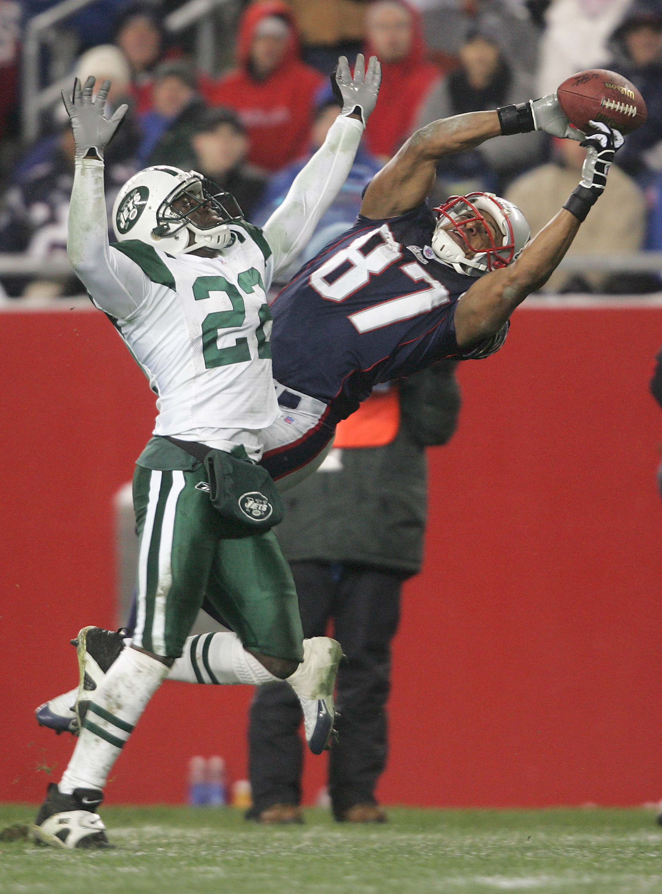 FOXBORO, MA - DECEMBER 4:  David Givens #87 of the New England Patriots fails to catch a pass against Justin Miller #22 of the New York Jets at Gillette Stadium on December 4, 2005 in Foxboro, Massachusetts.  (Photo by Nick Laham/Getty Images)