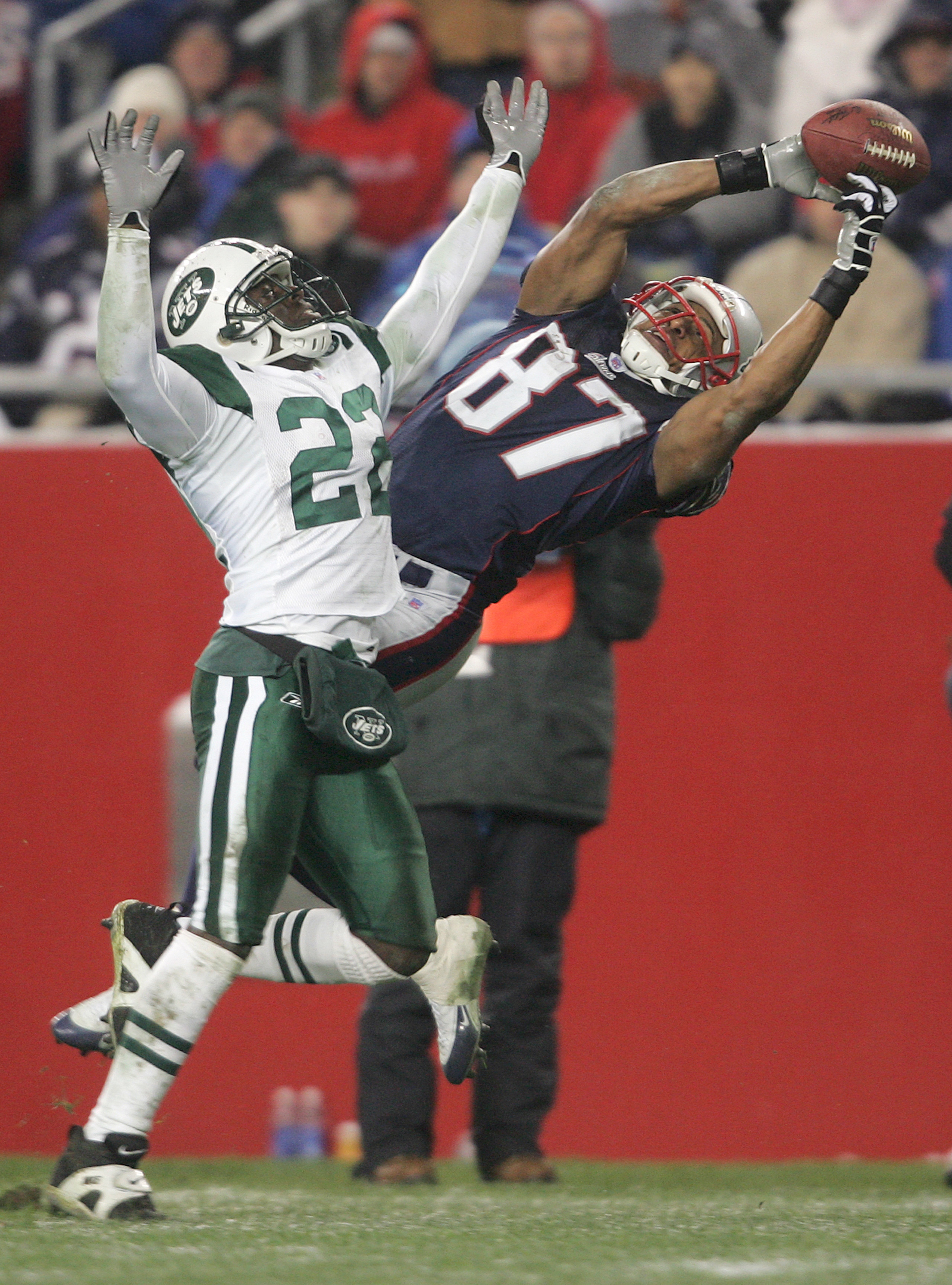 FOXBORO, MA - DECEMBER 4:  David Givens #87 of the New England Patriots fails to catch a pass against Justin Miller #22 of the New York Jets at Gillette Stadium on December 4, 2005 in Foxboro, Massachusetts.  (Photo by Nick Laham/Getty Images)