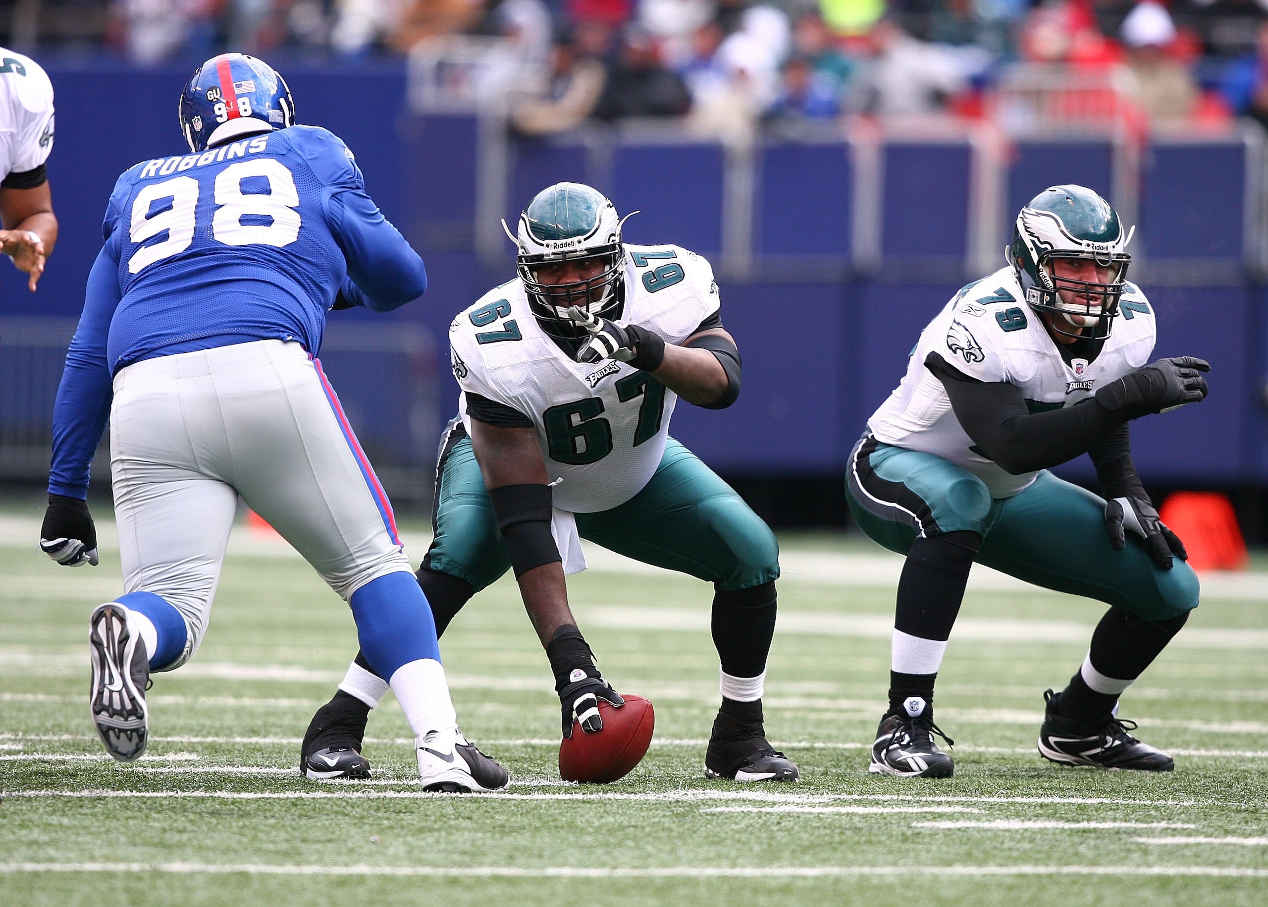 EAST RUTHERFORD, NJ - DECEMBER 07:  Jamaal Jackson #67, and Todd Herremans #79 of the Philadelphia Eagles get set to defend against Fred Robbins #98 of the New York Giants during their game on December 7, 2008 at Giants Stadium in East Rutherford, New Jer