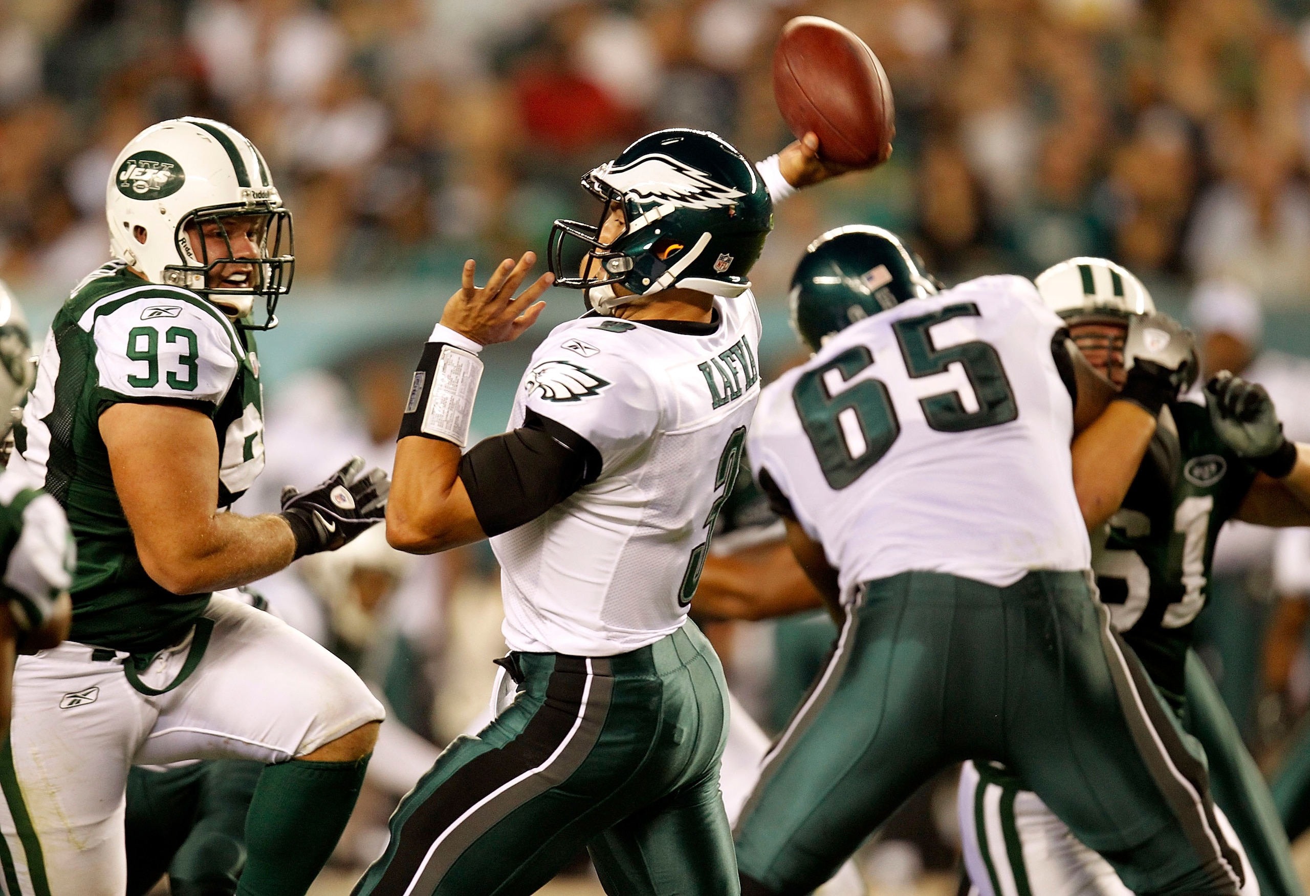 PHILADELPHIA - SEPTEMBER 02: Mike Kafka #3 of the Philadelphia Eagles passes under pressure from Matt Kroul #93 of the New York Jets during a preseason game at Lincoln Financial Field on September 2, 2010 in Philadelphia, Pennsylvania. (Photo by Jeff Ze PHILADELPHIA - SEPTEMBER 02: Mike Kafka #3 of the Philadelphia Eagles passes under pressure from Matt Kroul #93 of the New York Jets during a preseason game at Lincoln Financial Field on September 2, 2010 in Philadelphia, Pennsylvania. (Photo by Jeff Ze