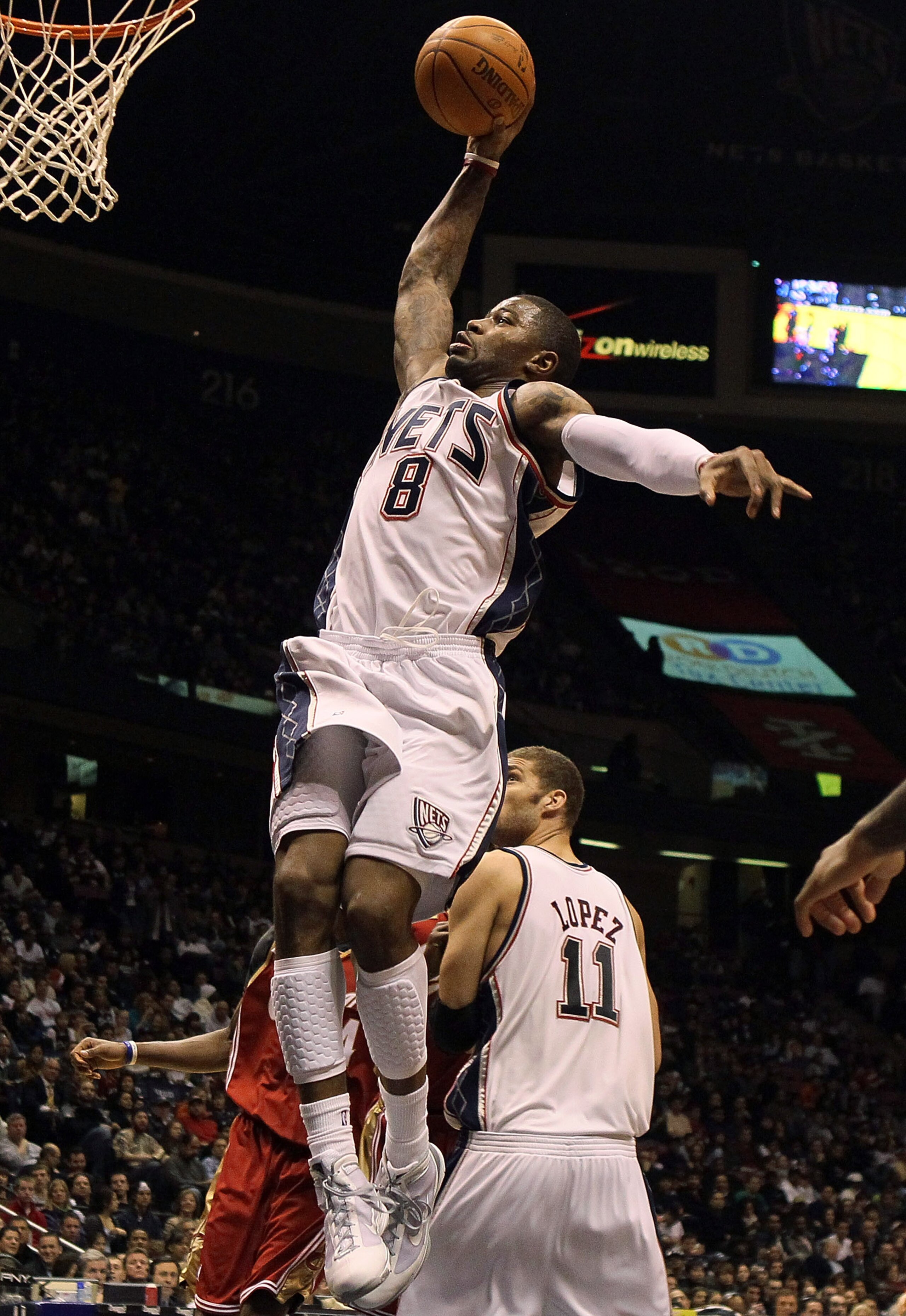 EAST RUTHERFORD, NJ - MARCH 03:  Terrence Williams #8 of the New Jersey Nets dunks against the Cleveland Cavaliers at the Izod Center on March 3, 2010 in East Rutherford, New Jersey.NOTE TO USER: User expressly acknowledges and agrees that, by downloading