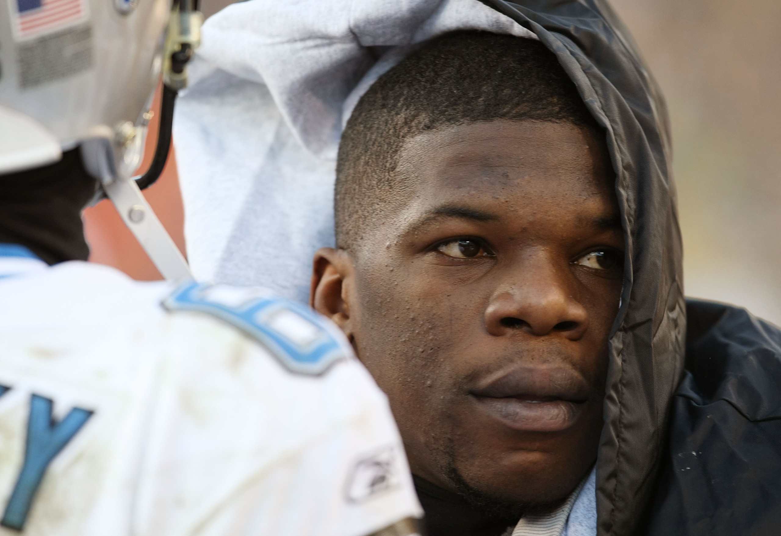 GREEN BAY, WI - DECEMBER 28: Kevin Smith #34 of the Detroit Lions talks with quarterback Dan Orlovsky #6 on the sidelines near the end of a game against the Green Bay Packers on December 28, 2008 at Lambeau Field in Green Bay, Wisconsin. The Packers defea