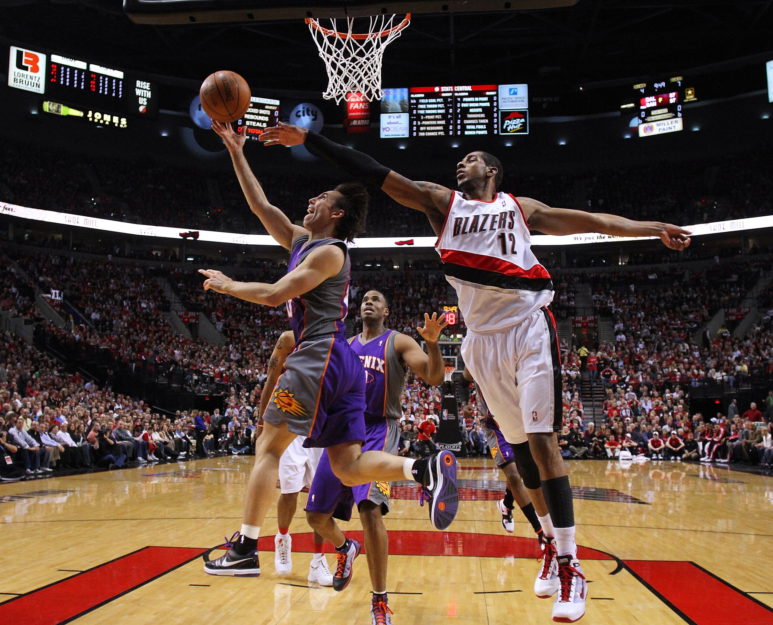 PORTLAND, OR - APRIL 29:  Steve Nash #13 of the Phoenix Suns shoots against LaMarcus Aldridge #12 of the Portland Trail Blazers during Game Six of the Western Conference Quarterfinals of the NBA Playoffs on April 29, 2010 at the Rose Garden in Portland, O
