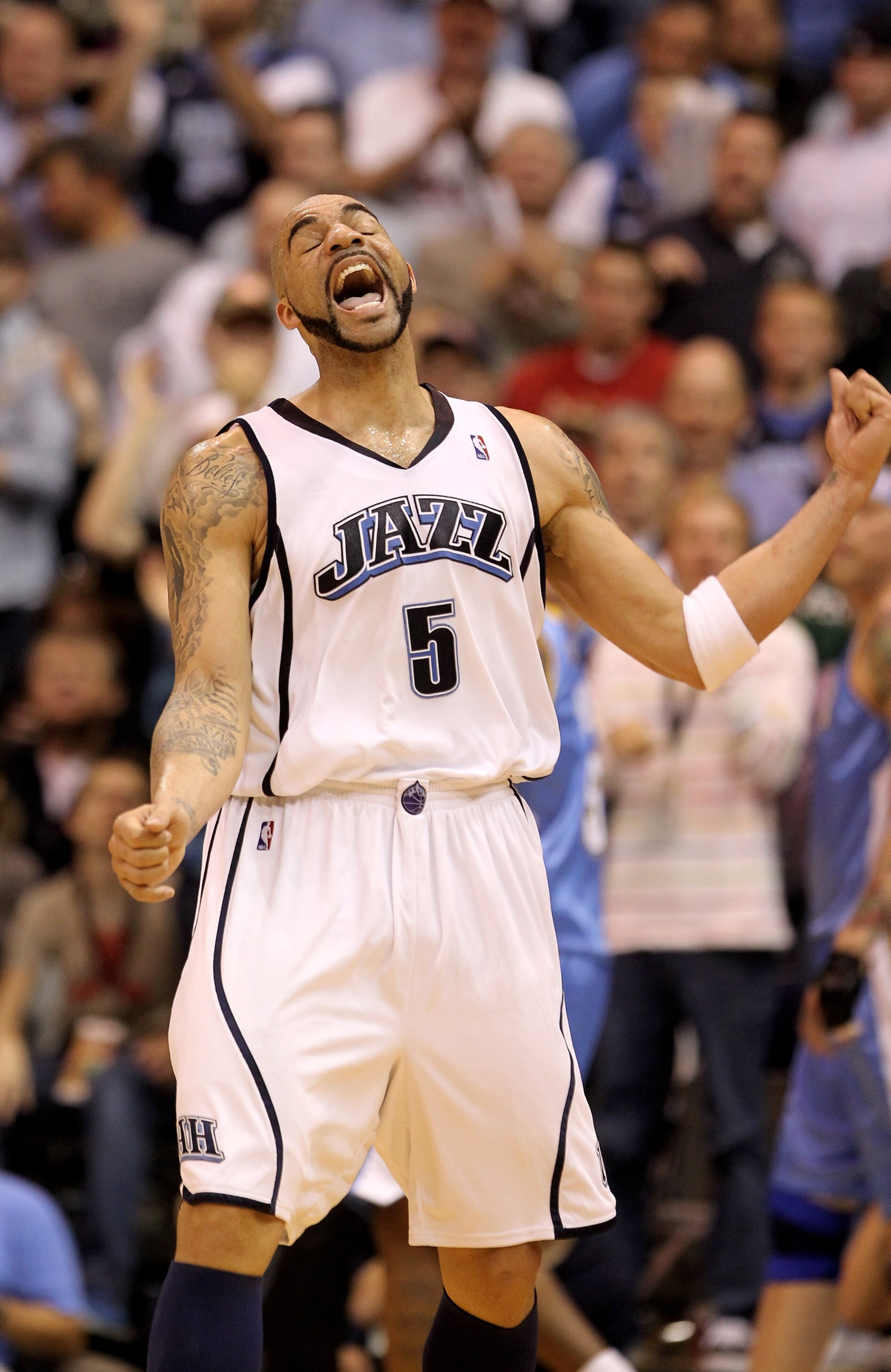 SALT LAKE CITY - APRIL 30:  Carlos Boozer #5 of the Utah Jazz celebrates after a Jazz went ahead 76-75 in the third period of their game against the Denver Nuggets during Game Six of the Western Conference Quarterfinals of the 2010 NBA Playoffs at EnergyS
