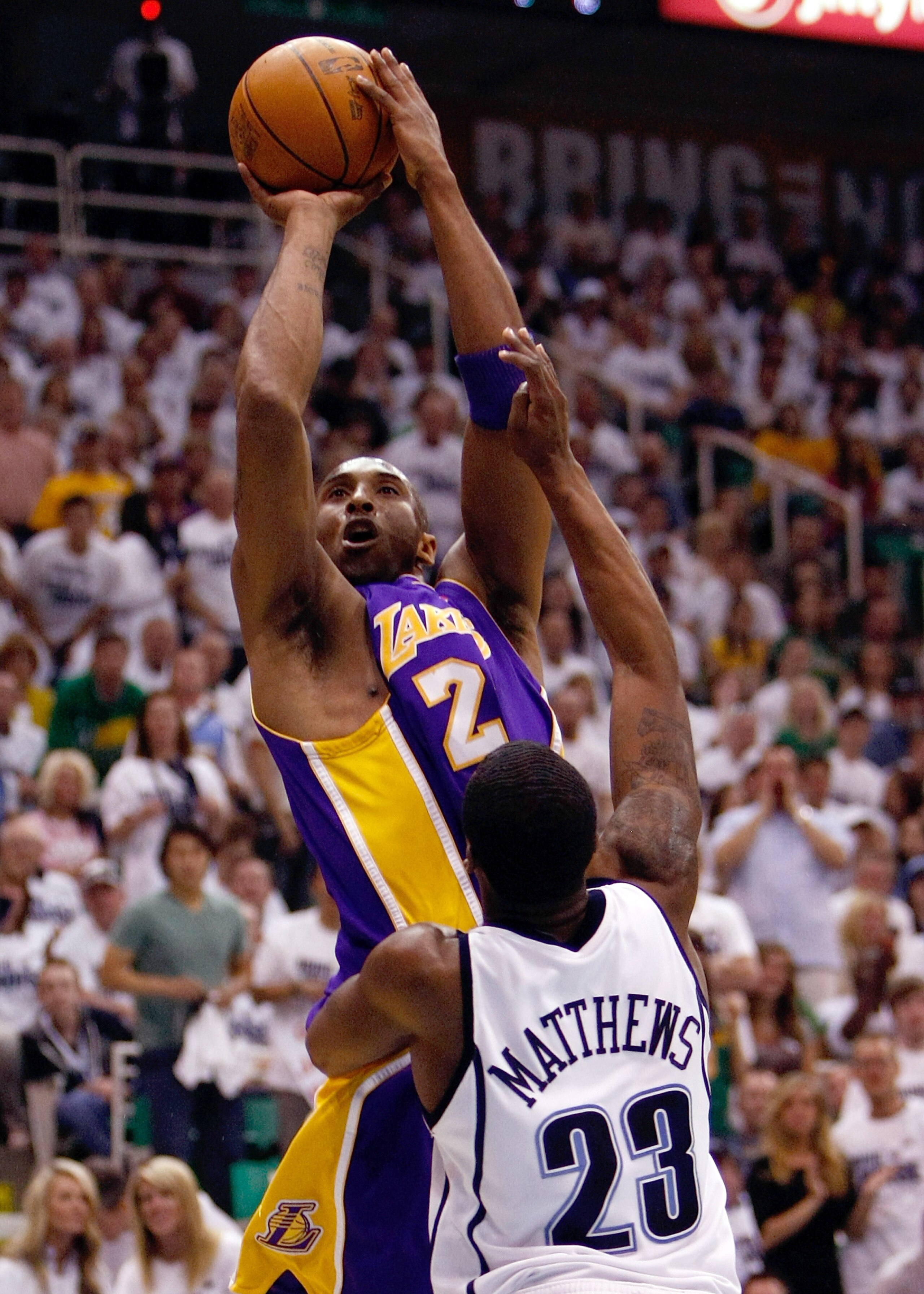 SALT LAKE CITY - MAY 08:  Kobe Bryant #24 of the Los Angeles Lakers shoots over Wesley Matthews #23 of the Utah Jazz during Game Three of the Western Conference Semifinals of the 2010 NBA Playoffs on May 8, 2010 at Energy Solutions Arena in Salt Lake City