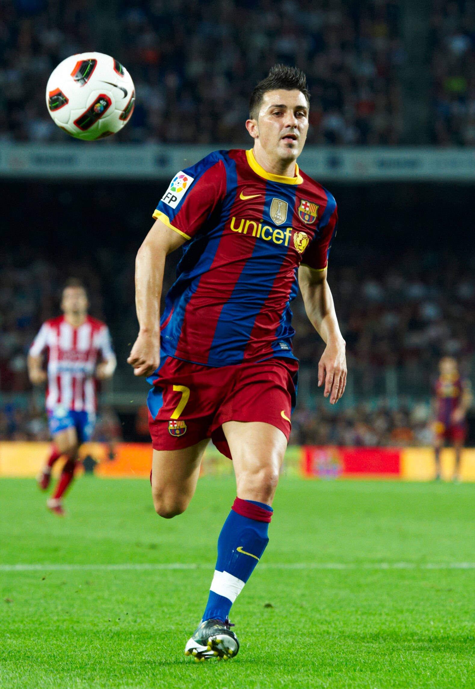 BARCELONA, SPAIN - SEPTEMBER 22:  David Villa of Barcelona in action during the La Liga match between Barcelona and Sporting de Gijon at Nou Camp on September 22, 2010 in Barcelona, Spain. Barcelona won 1-0.  (Photo by Manuel Queimadelos Alonso/Getty Imag