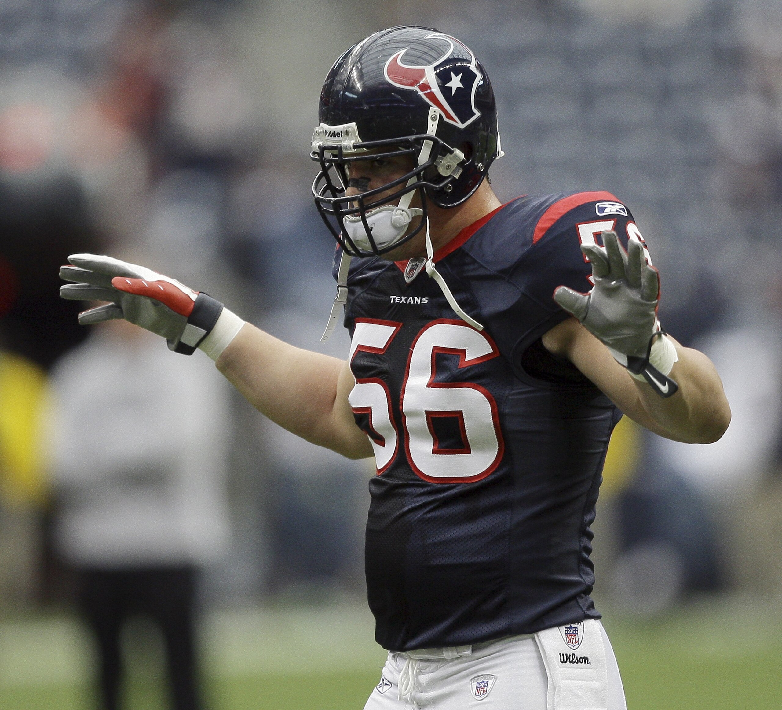 HOUSTON - DECEMBER 13:  Linebacker Brian Cushing #56 of the Houston Texans reacts against the Seattle Seahawks at Reliant Stadium on December 13, 2009 in Houston, Texas.  (Photo by Bob Levey/Getty Images)