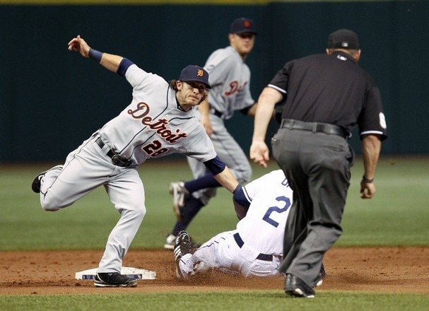 Will Rhymes tagging out a runner at 2nd base