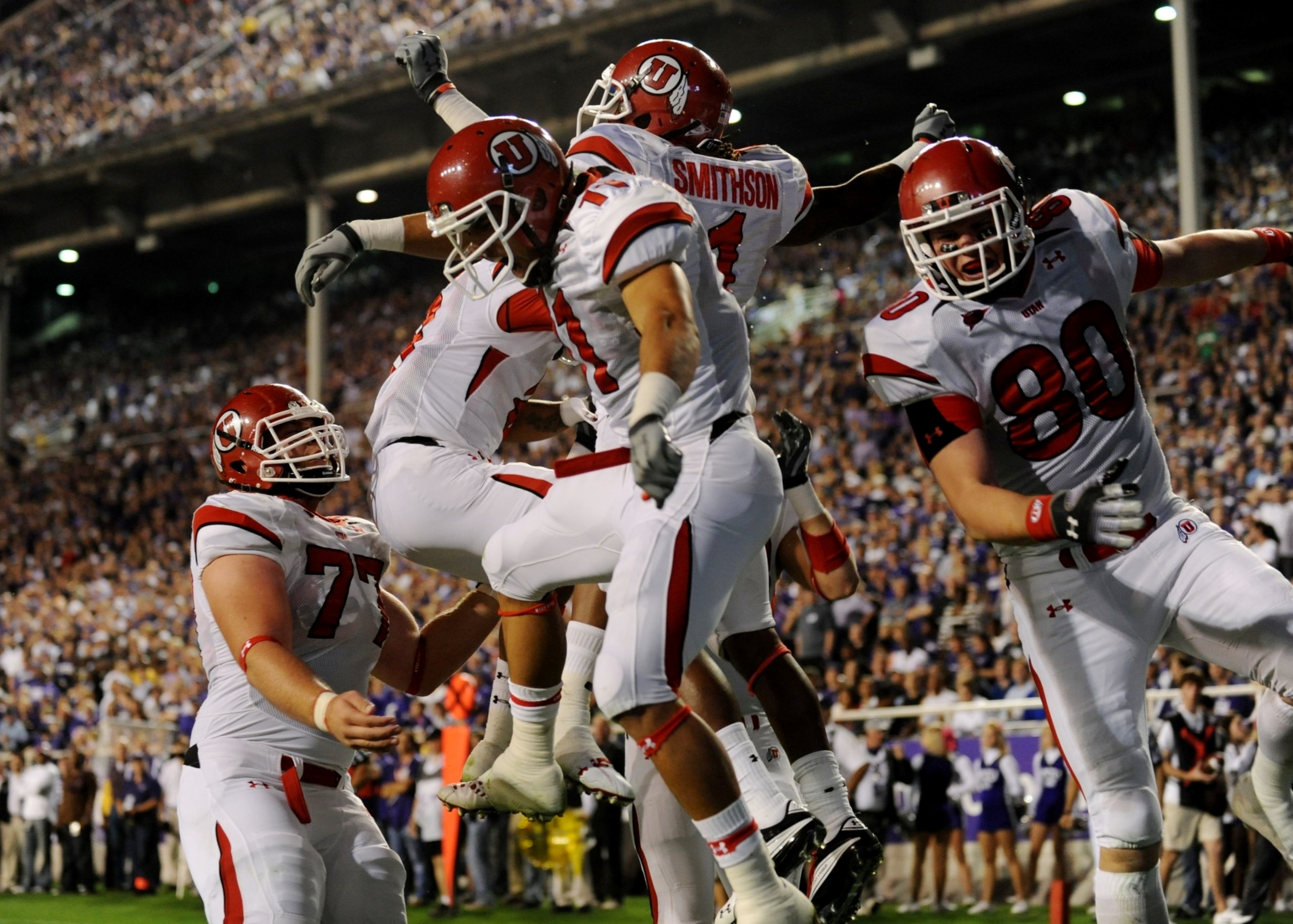 FORT WORTH, TX - NOVEMBER 14:  Shaky Smithson #1 of the Utah Utes celebrates with teammates after scoring a touchdown in the first quarter of the game against the TCU Horned Frogs at Amon G. Carter Stadium on November 14, 2009 in Fort Worth, Texas.  (Phot