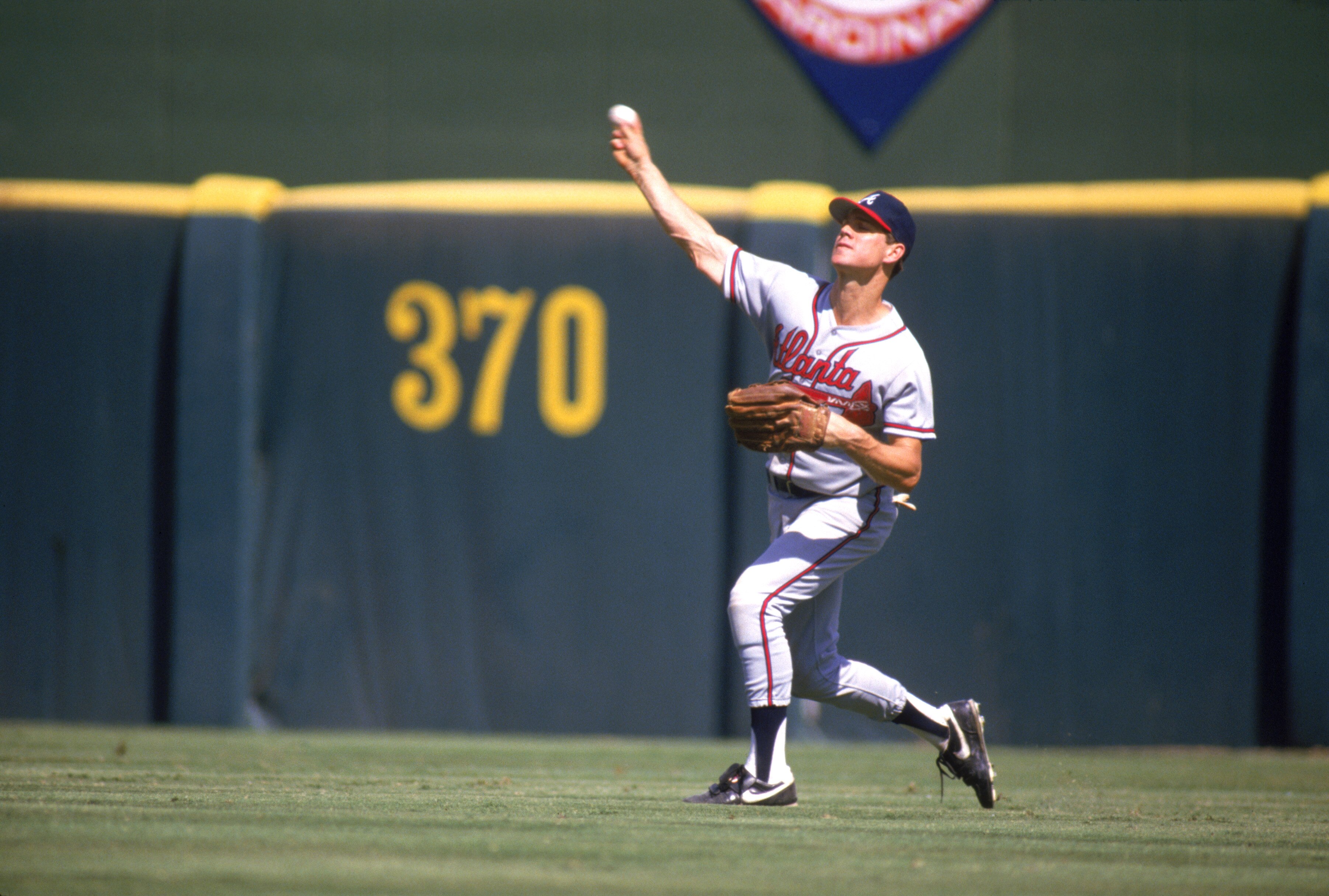 SAN DIEGO - 1987:  Dale Murphy #3 of the Atlanta Braves throws the ball to the infield during a game against the San Diego Padres in 1987 at Jack Murphy Stadium in San Diego, California.  (Photo by Stephen Dunn/Getty Images)