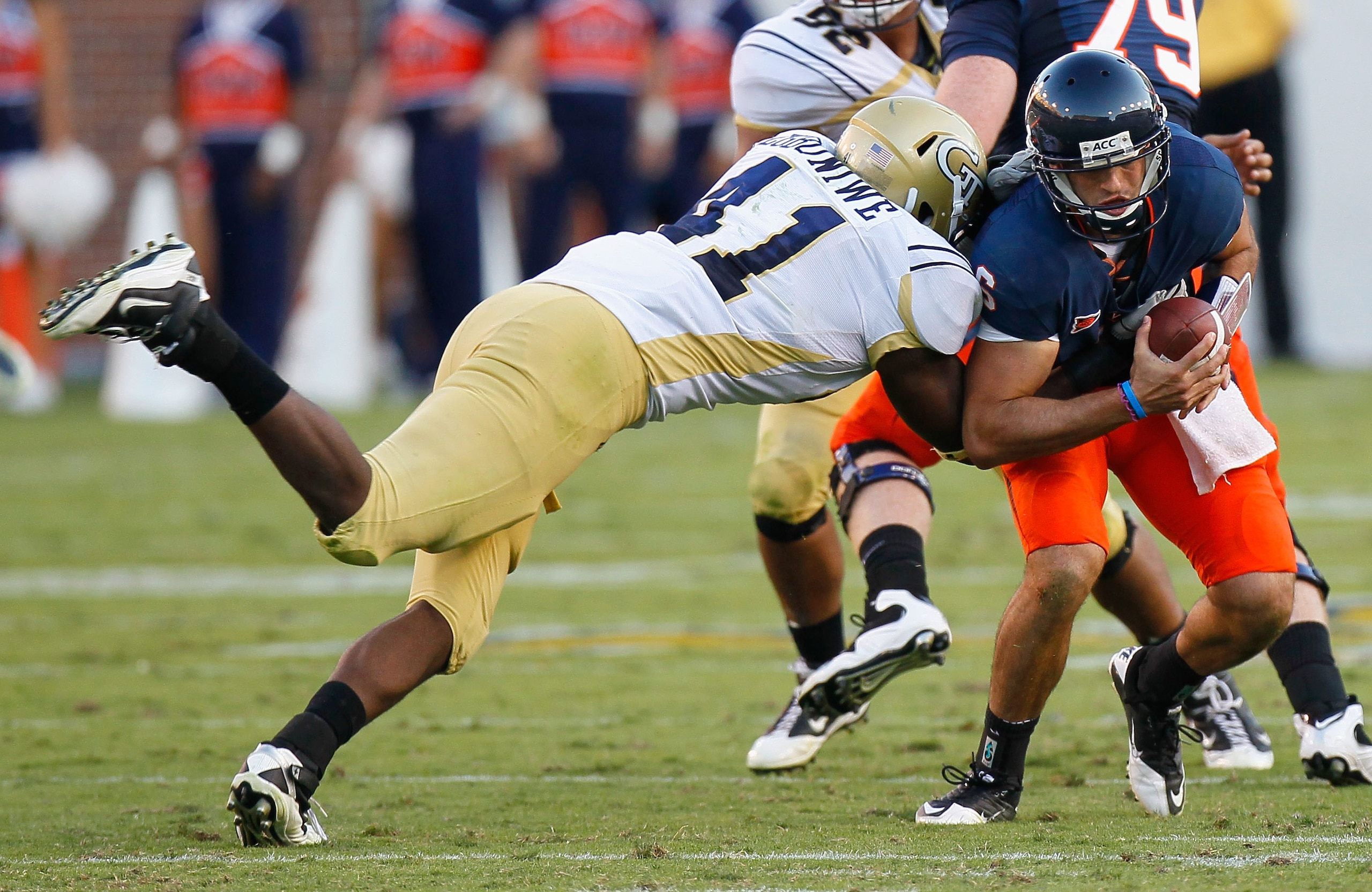 ATLANTA - OCTOBER 09:  Anthony Egbuniwe #41 of the Georgia Tech Yellow Jackets sacks quarterback Marc Verica #6 of the Virginia Cavaliers at Bobby Dodd Stadium on October 9, 2010 in Atlanta, Georgia.  (Photo by Kevin C. Cox/Getty Images)