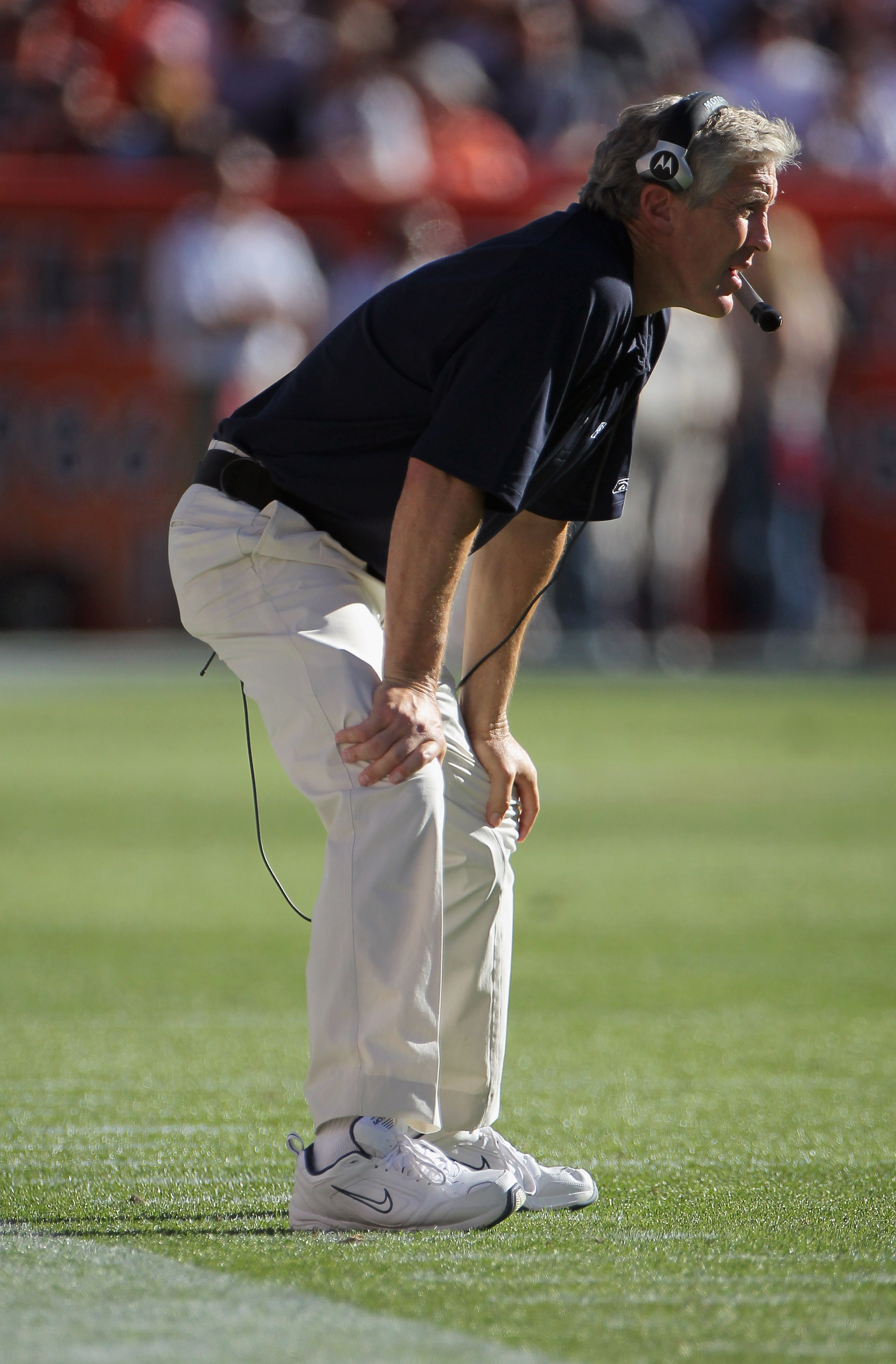 DENVER - SEPTEMBER 19:  Head coach Pete Carroll of the Seattle Seahawks directs his team against the Denver Broncos at INVESCO Field at Mile High on September 19, 2010 in Denver, Colorado. The Broncos defeated the Seahawks 31-14.  (Photo by Doug Pensinger