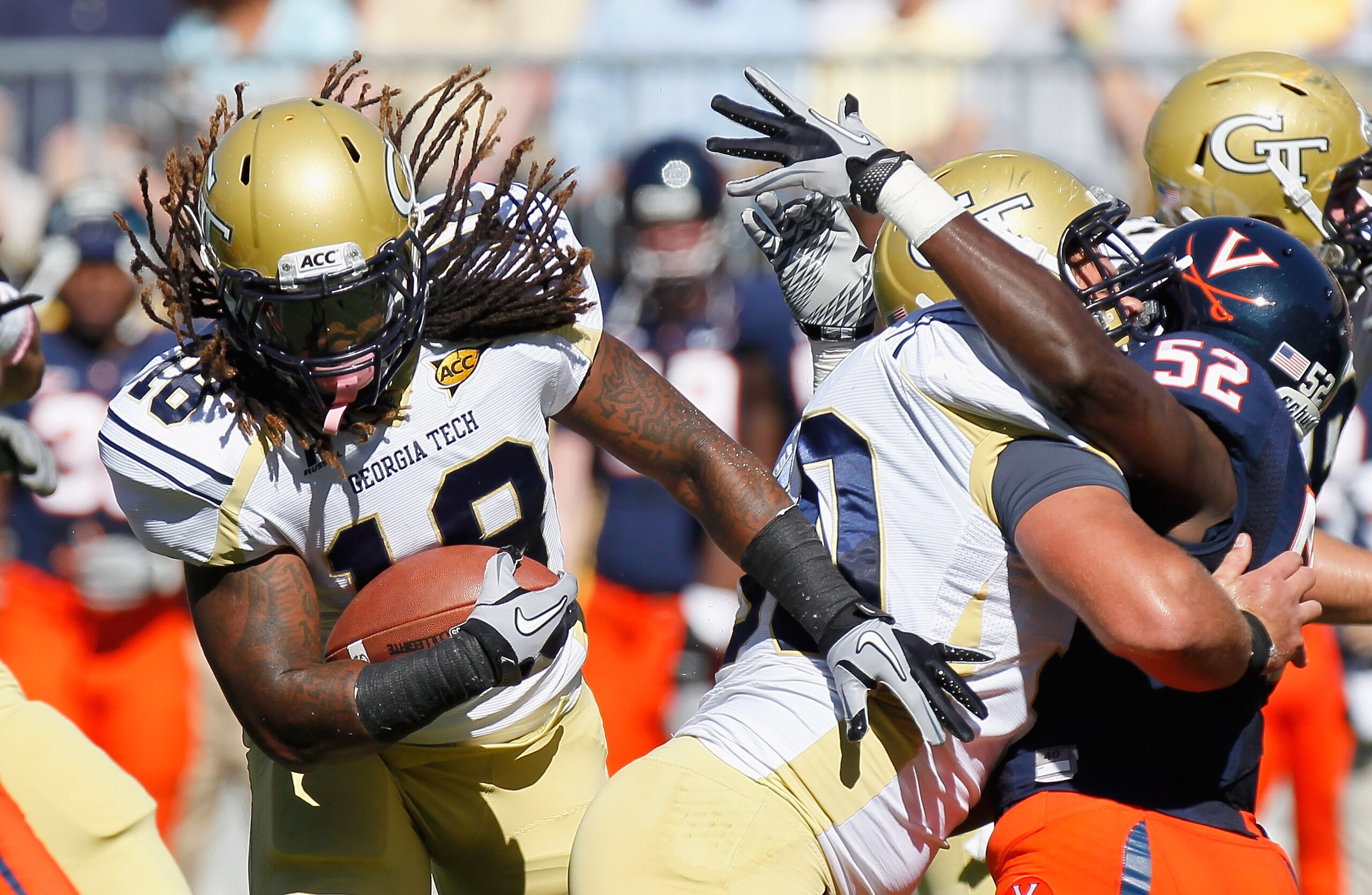 ATLANTA - OCTOBER 09:  Anthony Allen #18 of the Georgia Tech Yellow Jackets rushes through the line against the Virginia Cavaliers at Bobby Dodd Stadium on October 9, 2010 in Atlanta, Georgia.  (Photo by Kevin C. Cox/Getty Images)