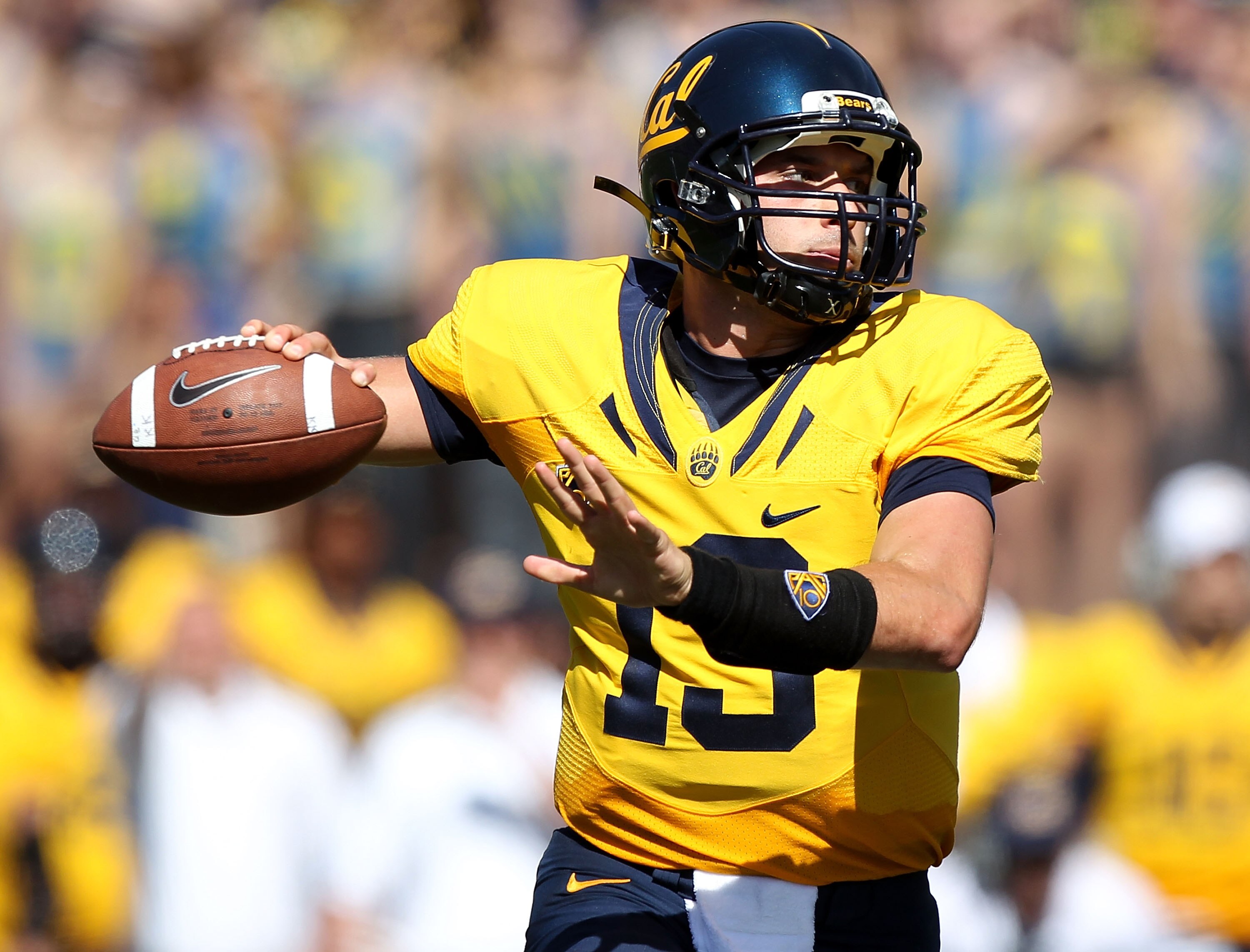 BERKELEY, CA - OCTOBER 09: Kevin Riley #13 of the California Golden Bears passes against the UCLA Bruins at California Memorial Stadium on October 9, 2010 in Berkeley, California. (Photo by Jed Jacobsohn/Getty Images)