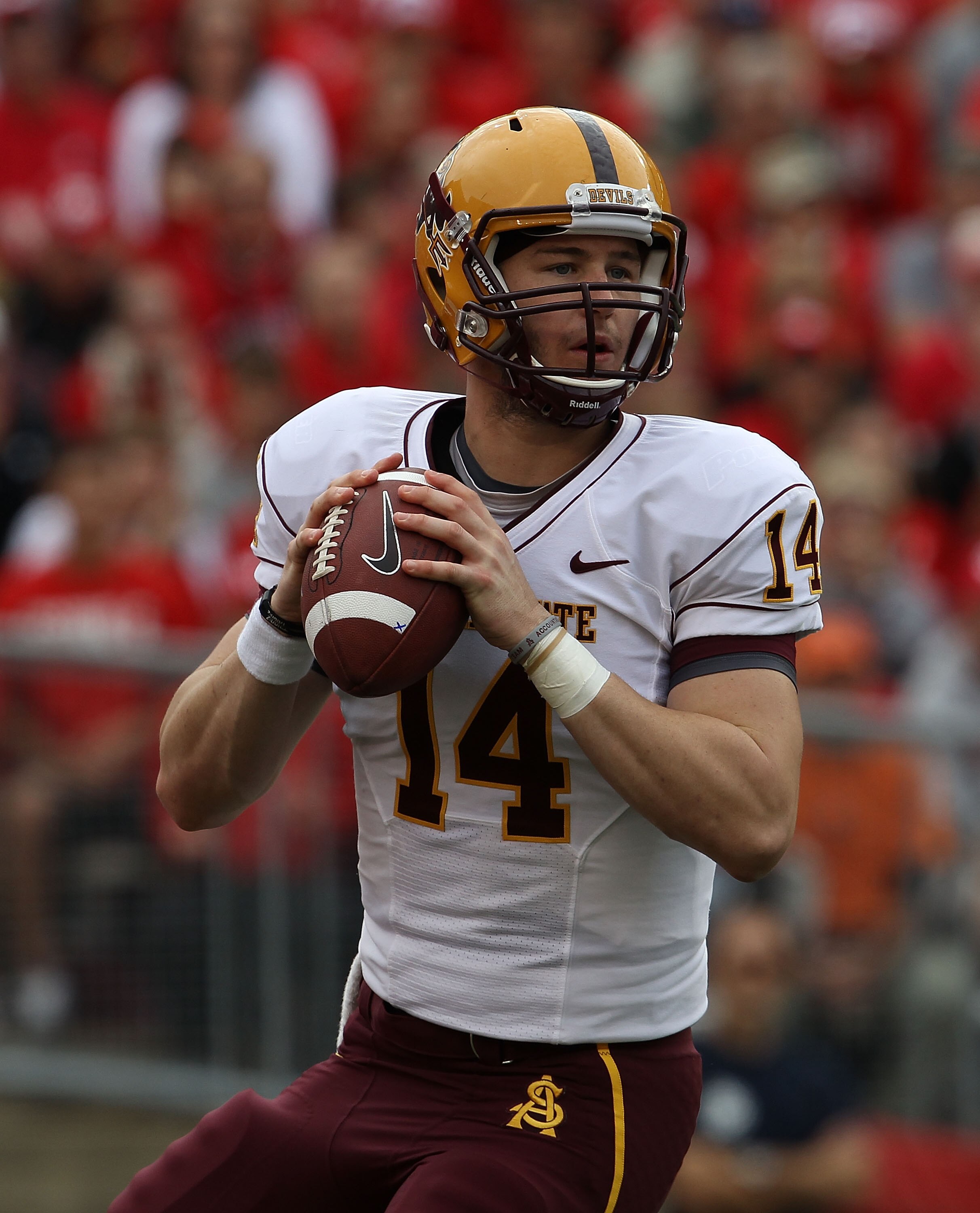 MADISON, WI - SEPTEMBER 18: Steven Threet #14 of the Arizona State Sun Devils looks for a receiver against the Wisconsin Badgers at Camp Randall Stadium on September 18, 2010 in Madison, Wisconsin. Wisconsin defeated Arizona State 20-19.  (Photo by Jonath