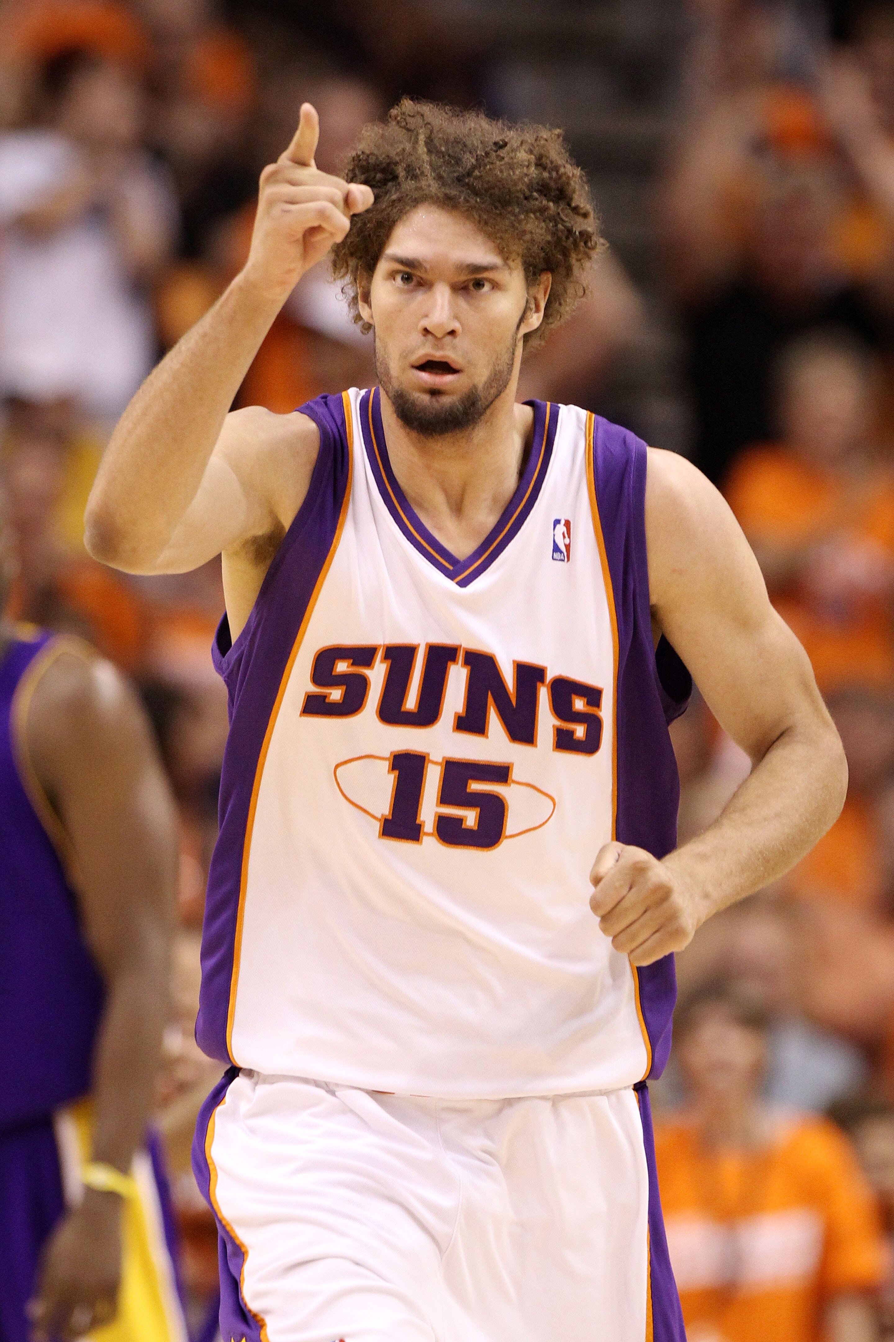 PHOENIX - MAY 23:  Robin Lopez #15 of the Phoenix Suns reacts to a play against the Los Angeles Lakers in the second quarter of Game Three of the Western Conference Finals during the 2010 NBA Playoffs at US Airways Center on May 23, 2010 in Phoenix, Arizo