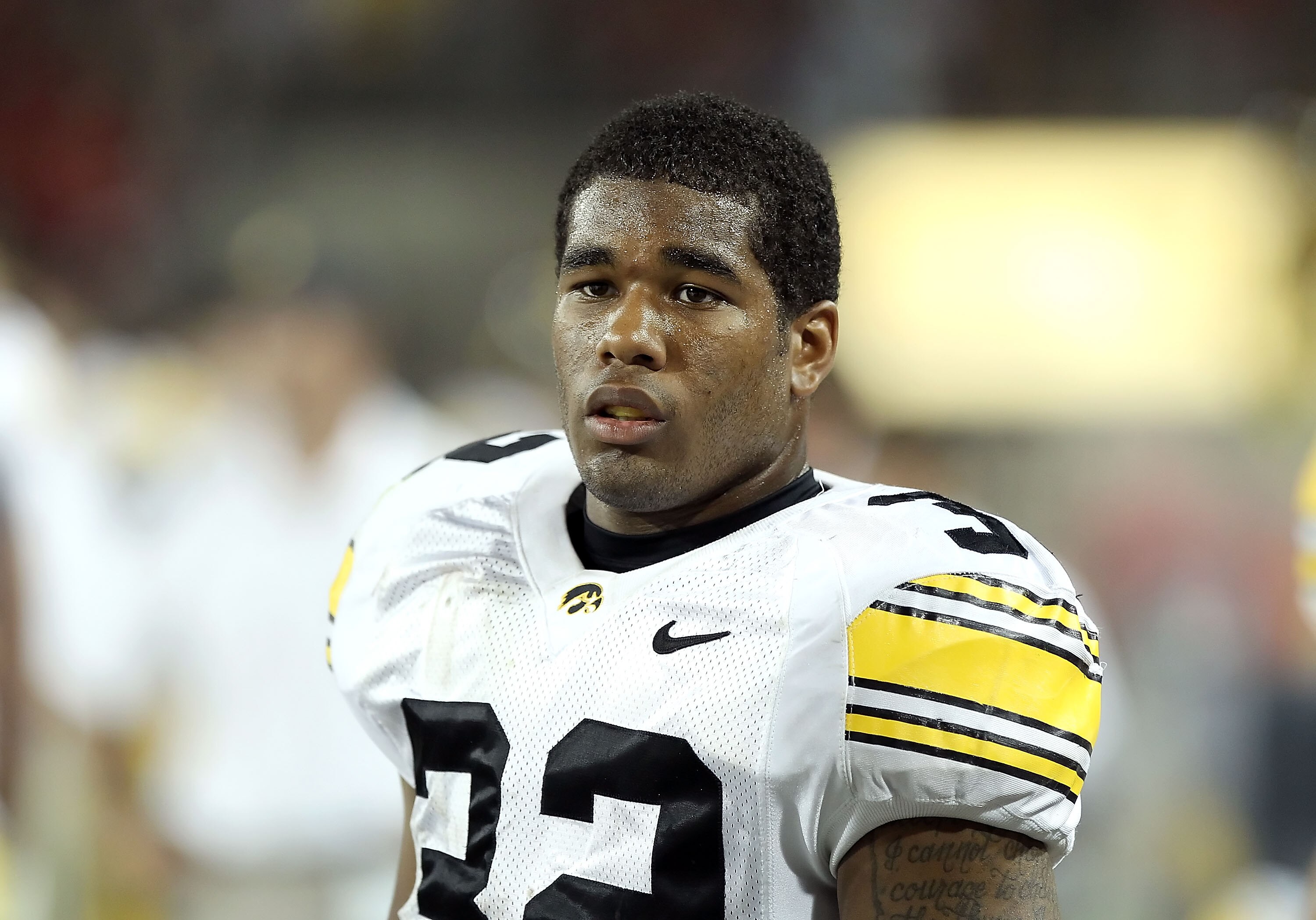 TUCSON, AZ - SEPTEMBER 18:  Runningback Adam Robinson #32 of the Iowa Hawkeyes watches from the sidelines during the college football game against the Arizona Wildcats at Arizona Stadium on September 18, 2010 in Tucson, Arizona. The Wildcats defeated the 