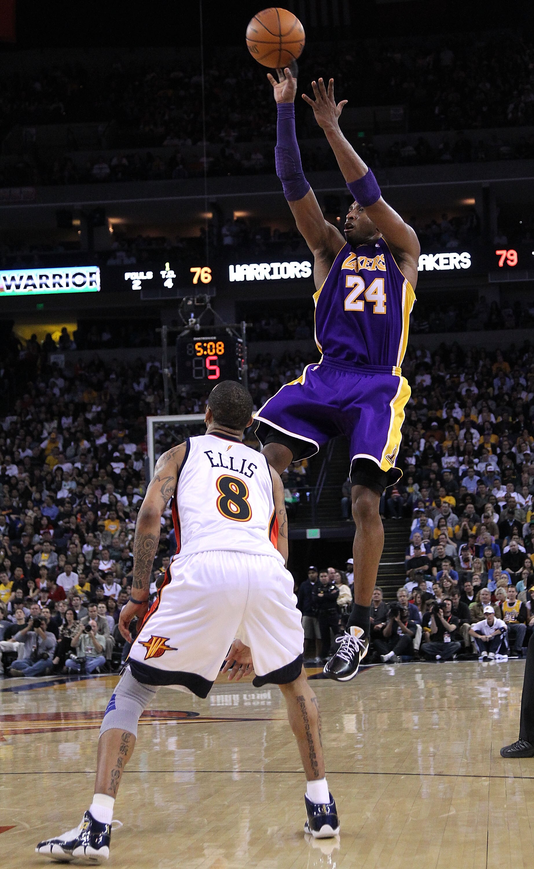 OAKLAND, CA - MARCH 15:  Kobe Bryant #24 of the Los Angeles Lakers shoots over Monta Ellis #8 of the Golden State Warriors during an NBA game at Oracle Arena on March 15, 2010 in Oakland, California. NOTE TO USER: User expressly acknowledges and agrees th