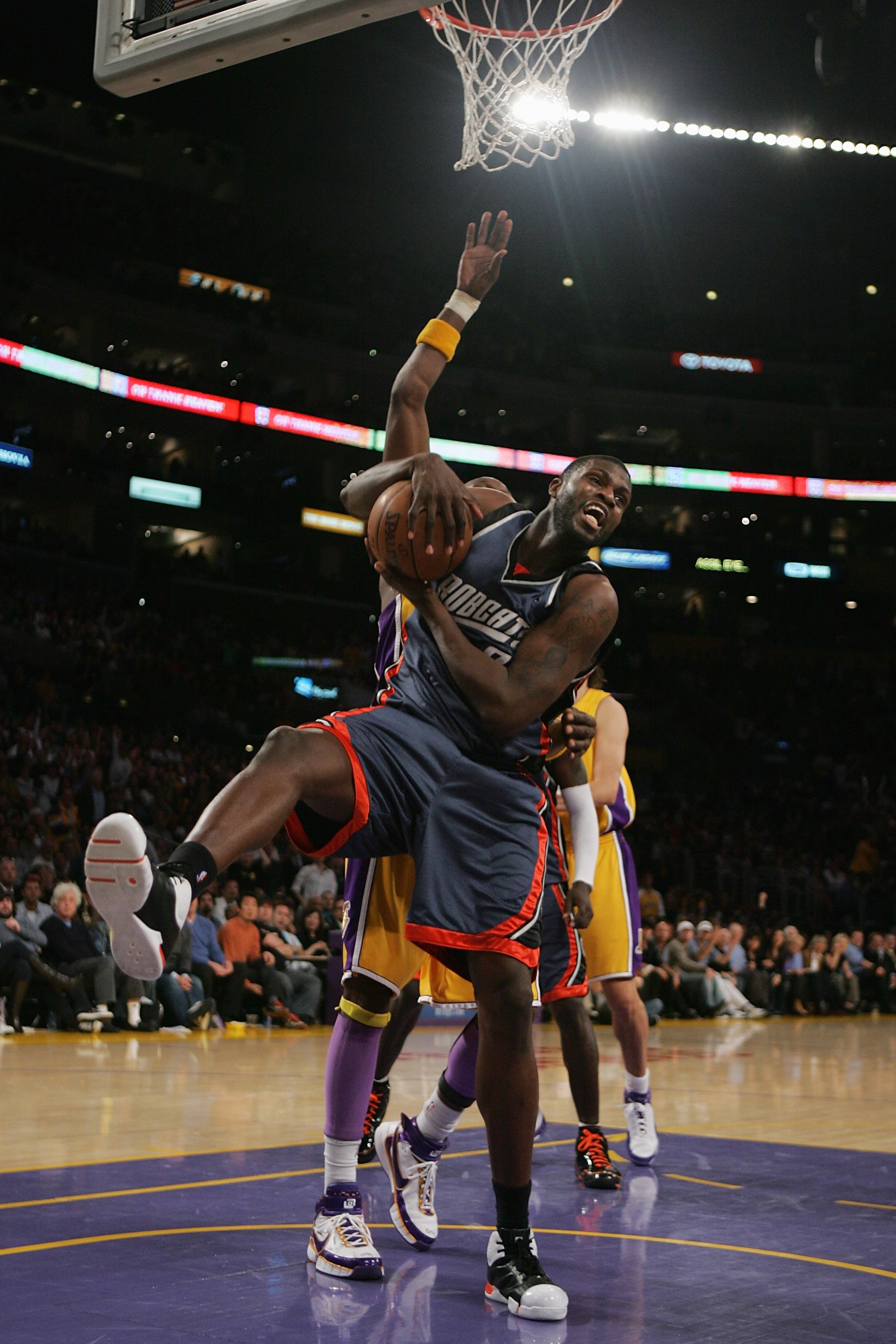 LOS ANGELES - MARCH 26:  Nazr Mohammed #6 of the Charlotte Bobcats pulls down a rebound during the game against the Los Angeles Lakers on March 26, 2008 at Staples Center in Los Angeles, California.  The Bobcats won 108-95.  NOTE TO USER: User expressly a