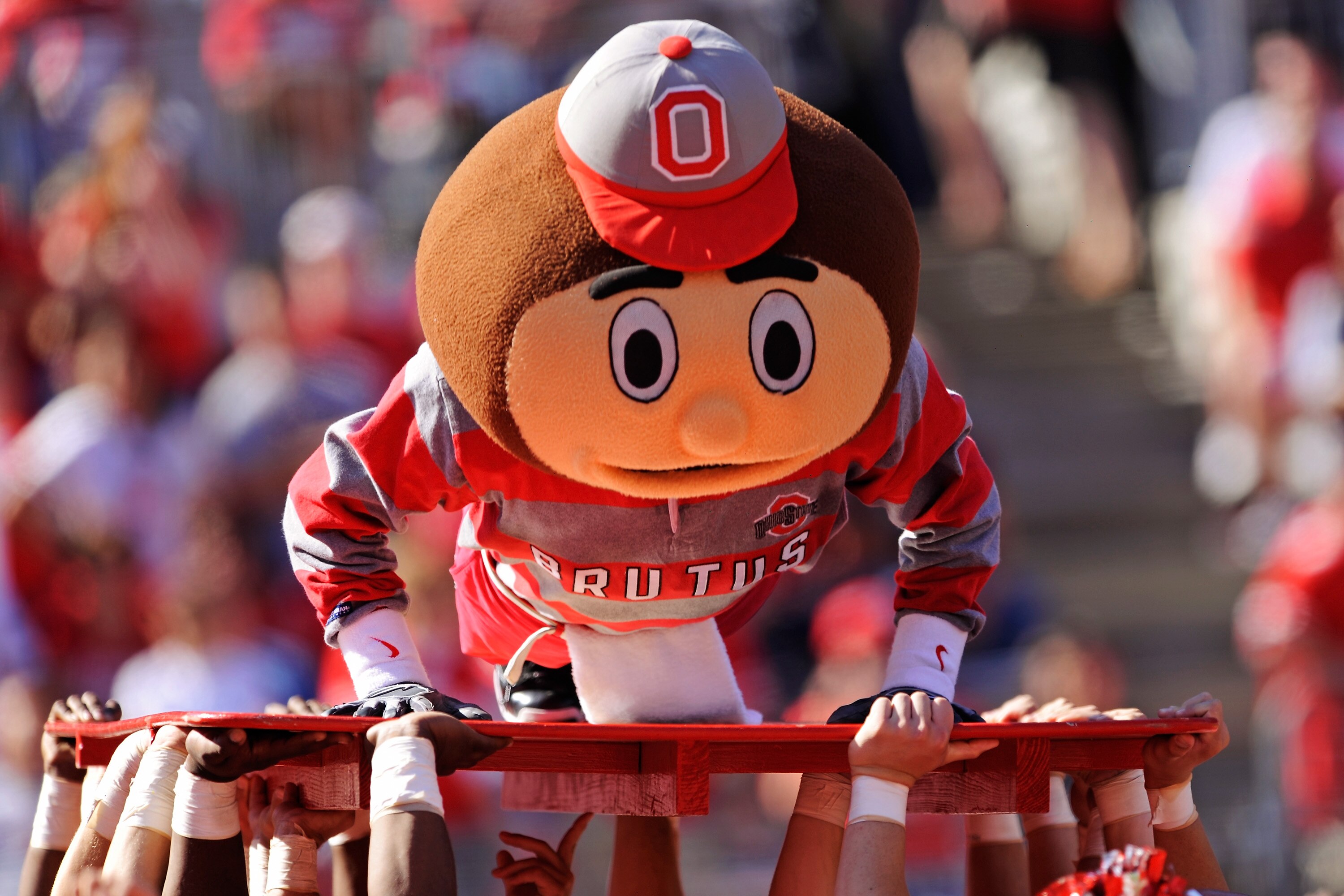 COLUMBUS, OH - OCTOBER 9:  Ohio State Buckeyes mascot Brutus Buckeye performs pushups equal to the number of points Ohio State has scored against the Indiana Hoosiers at Ohio Stadium on October 9, 2010 in Columbus, Ohio. Ohio State defeated Indiana 38-10.