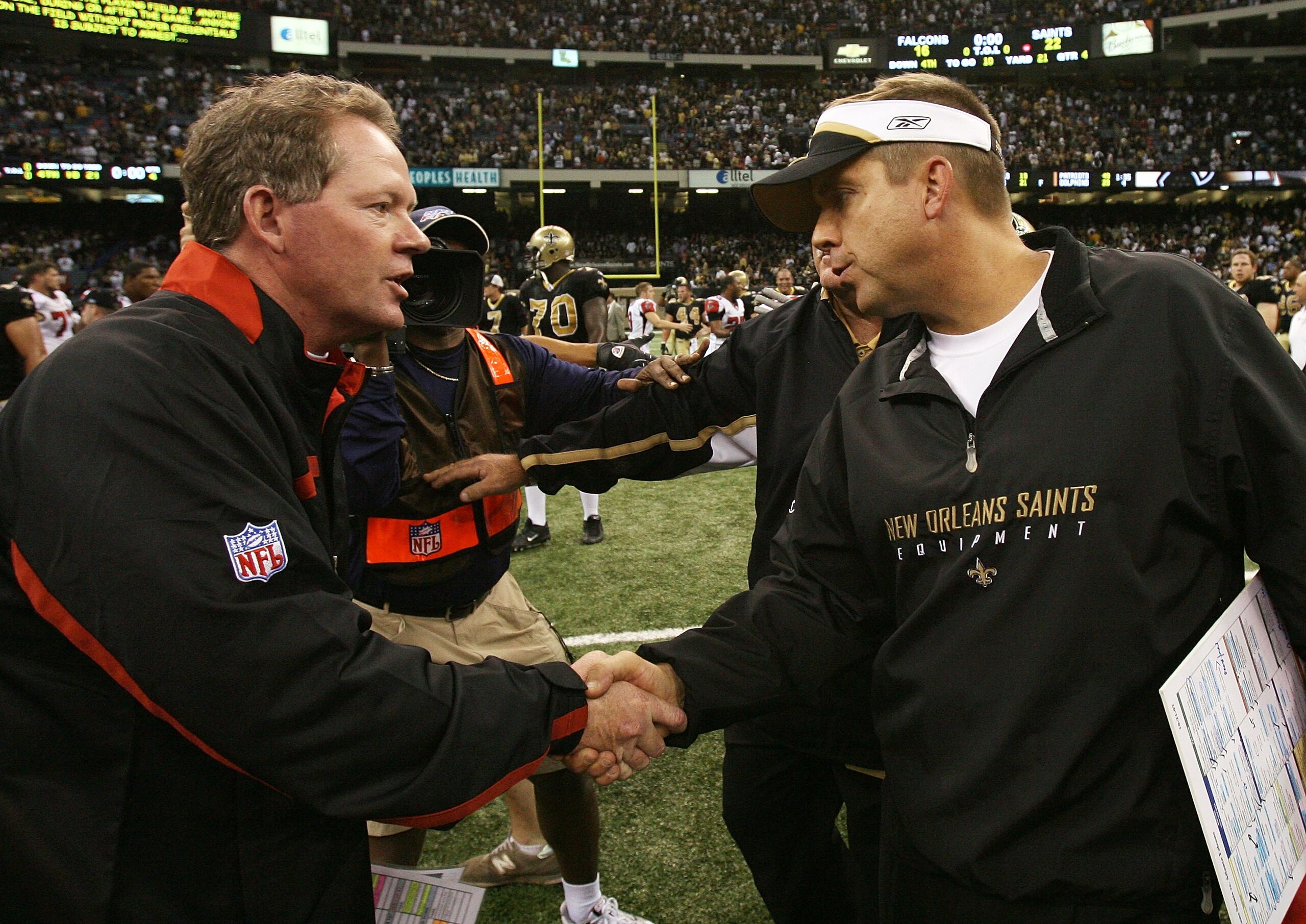 NEW ORLEANS - OCTOBER 21: Head coach Bobby Petrino of the Atlanta Falcons congratulates head coach Sean Payton of the New Orleans Saints after the game at the Superdome on October 21, 2007 in New Orleans, Louisiana. The Saints defeated the Falcons 22-16.