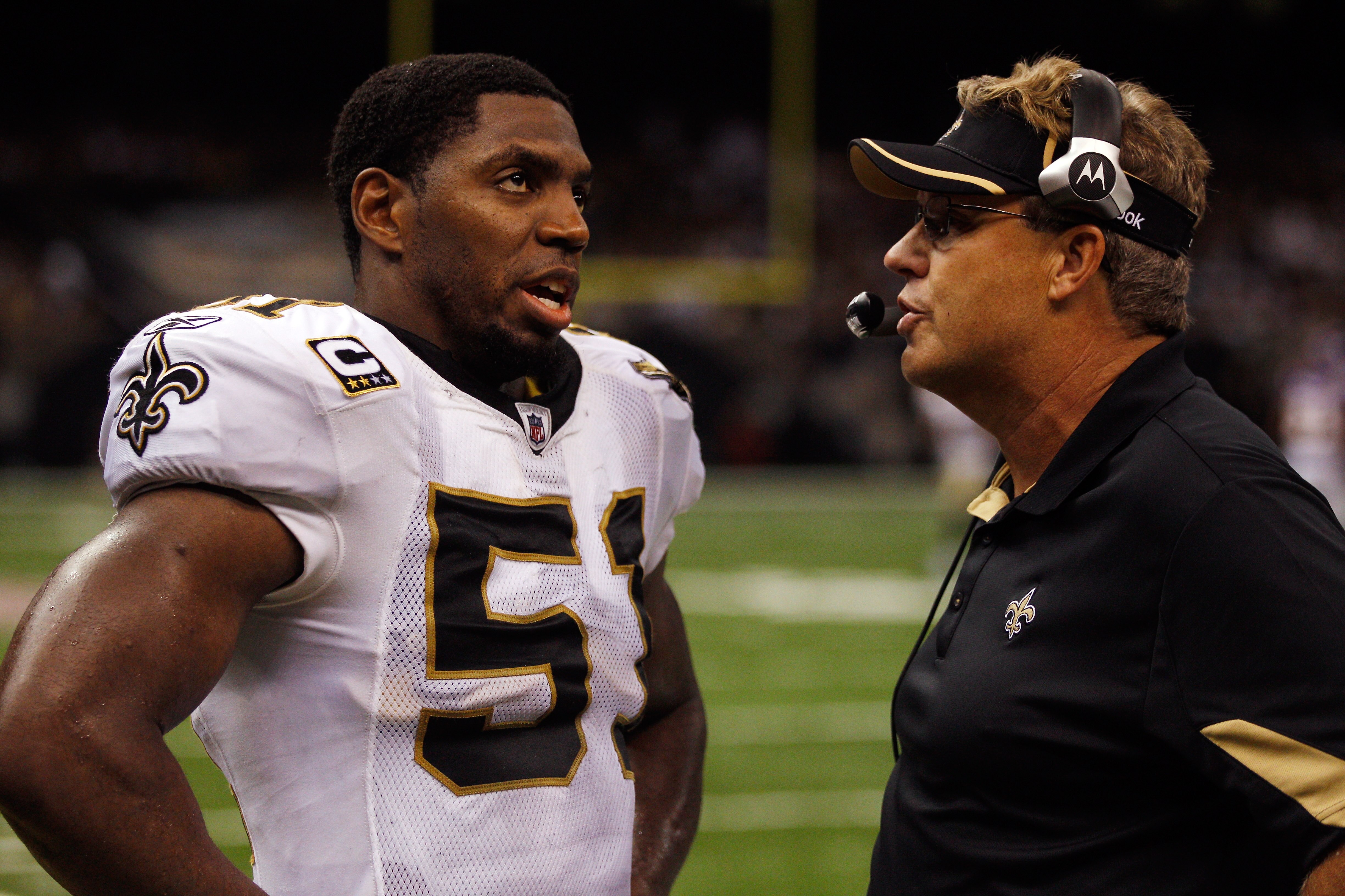 NEW ORLEANS - SEPTEMBER 09:  Jonathan Vilma #51 talks with Gregg Williams of the New Orleans Saints during the game against the Minnesota Vikings at Louisiana Superdome on September 9, 2010 in New Orleans, Louisiana.  (Photo by Chris Graythen/Getty Images