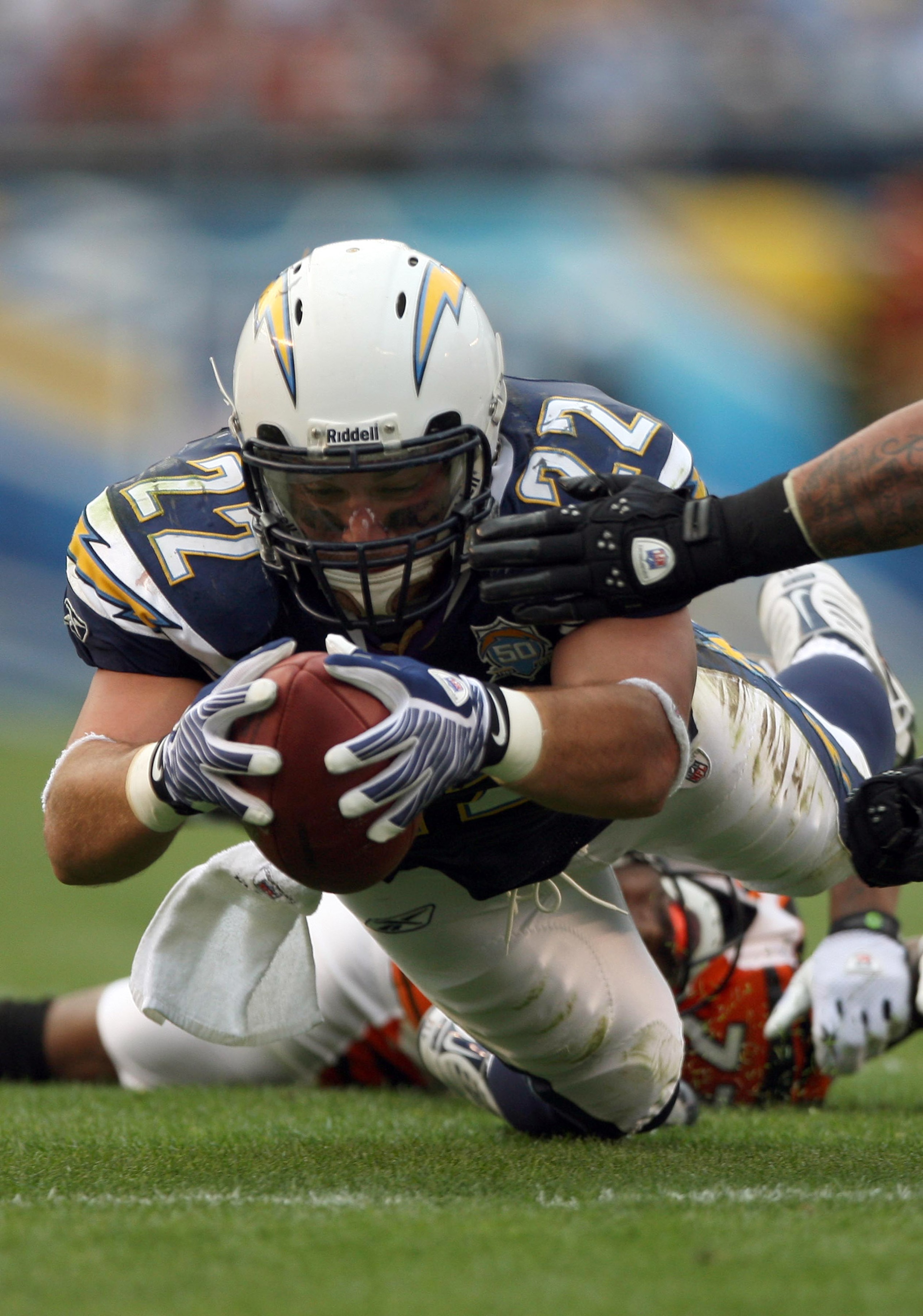 SAN DIEGO, CA - DECEMBER 20:  Full-back Jacob Hester #22 of the San Diego Chargers dives with the ball against the Cincinnati Bengals during the NFL game on December 20, 2009 at Qualcomm Stadium in San Diego, California.  (Photo by Donald Miralle/Getty Im