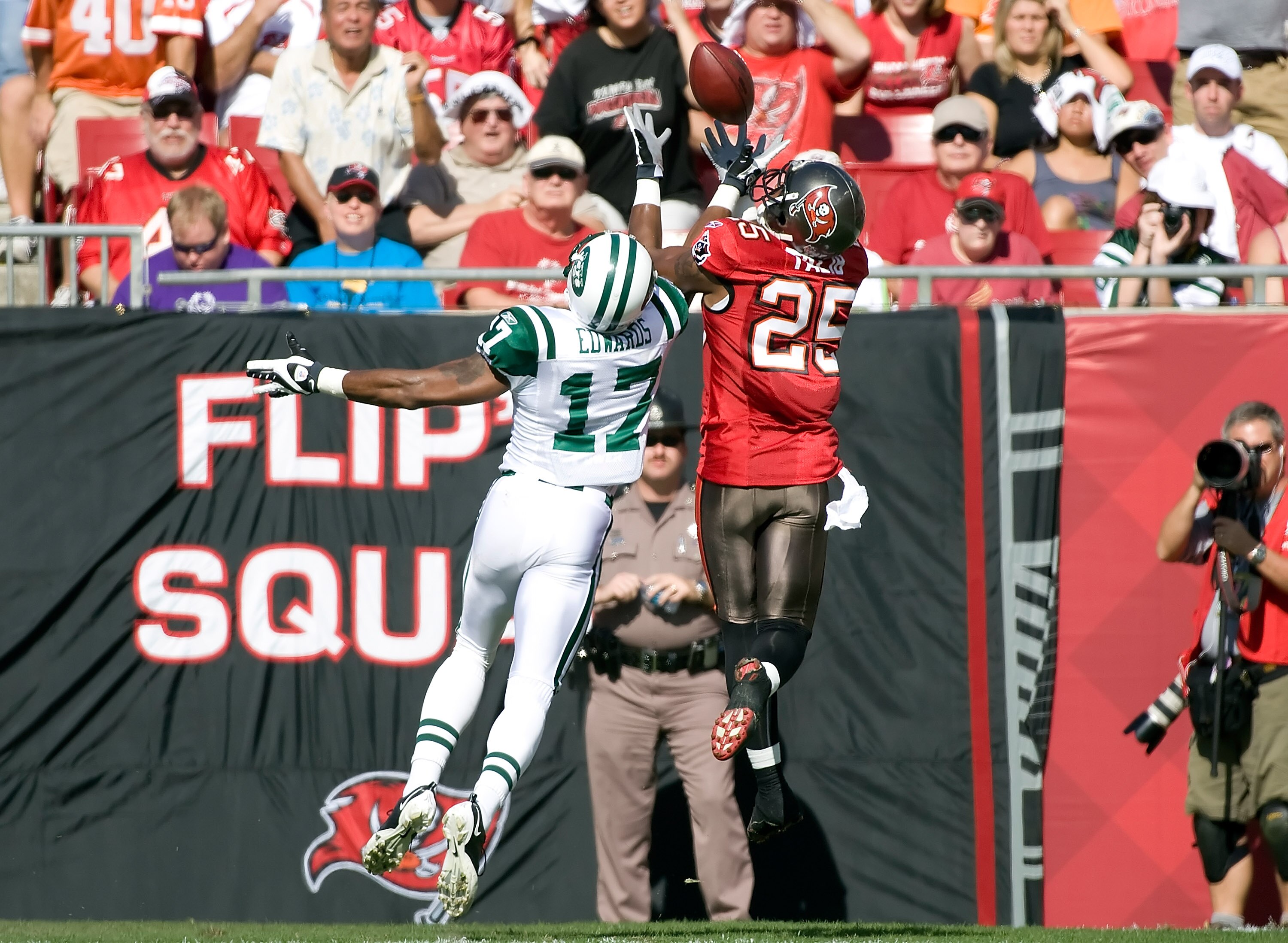 TAMPA, FL - DECEMBER 13:  Cornerback Aqib Talib #25 of the Tampa Bay Buccaneers breaks up a pass intended for receiver Braylon Edwards #17 of the New York Jets during the game at Raymond James Stadium on December 13, 2009 in Tampa, Florida.  (Photo by J.