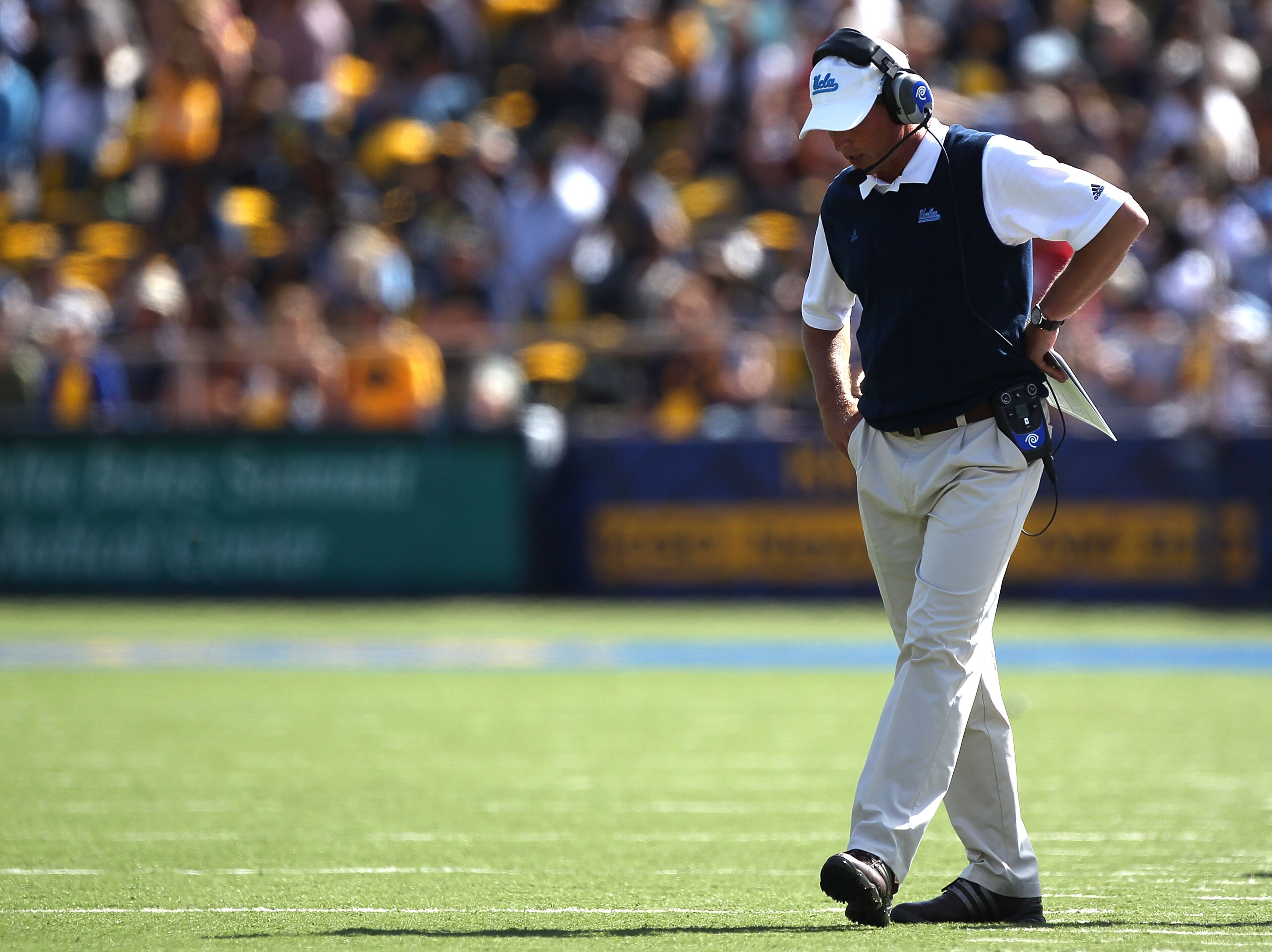 BERKELEY, CA - OCTOBER 09: Head coach Rick Neuheisel of the UCLA Bruins looks on against the California Golden at California Memorial Stadium on October 9, 2010 in Berkeley, California. (Photo by Jed Jacobsohn/Getty Images)