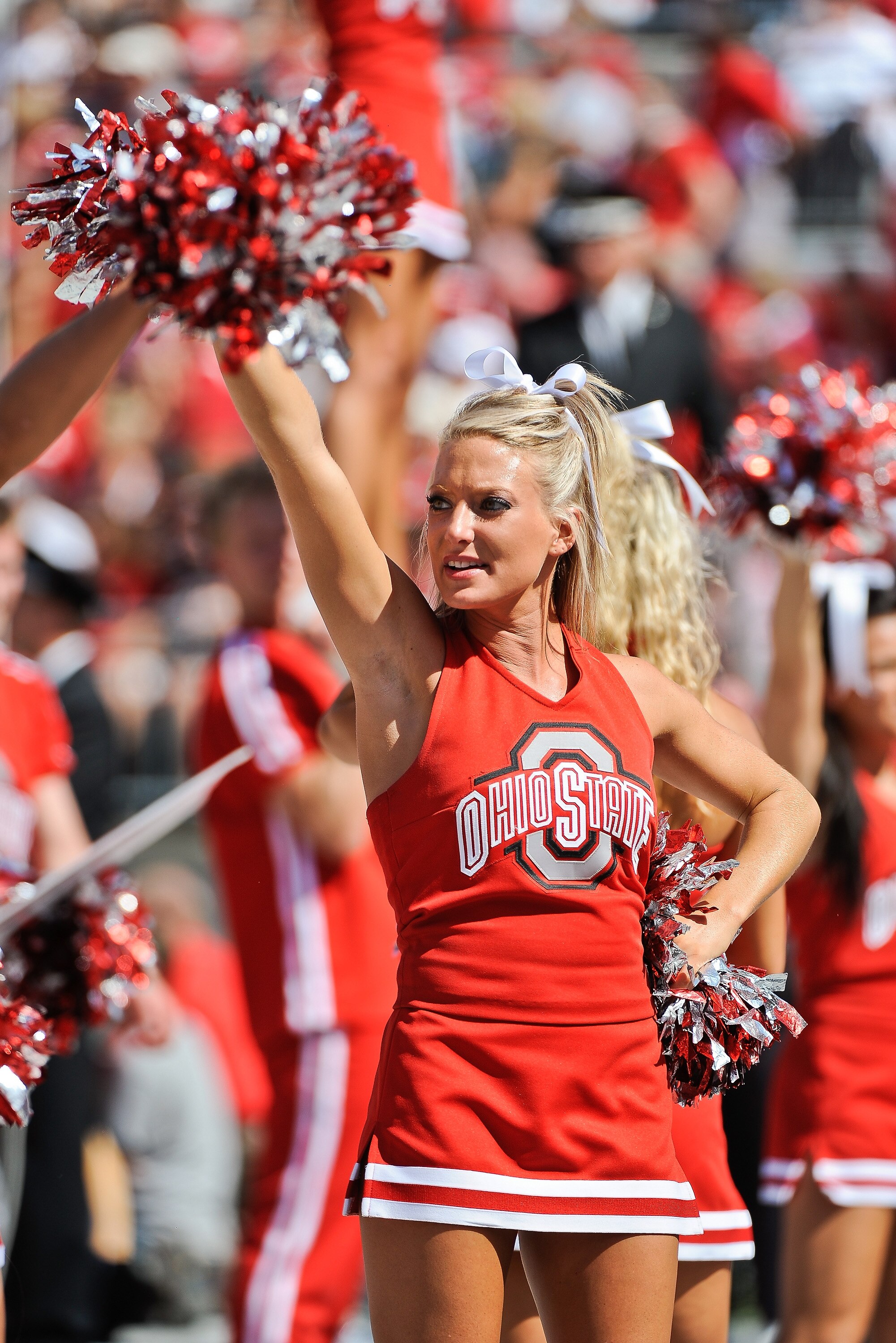 COLUMBUS, OH - SEPTEMBER 18:  An Ohio State Buckeyes cheerleader cheers on the Buckeyes as they play the Ohio Bobcats at Ohio Stadium on September 18, 2010 in Columbus, Ohio.  (Photo by Jamie Sabau/Getty Images)