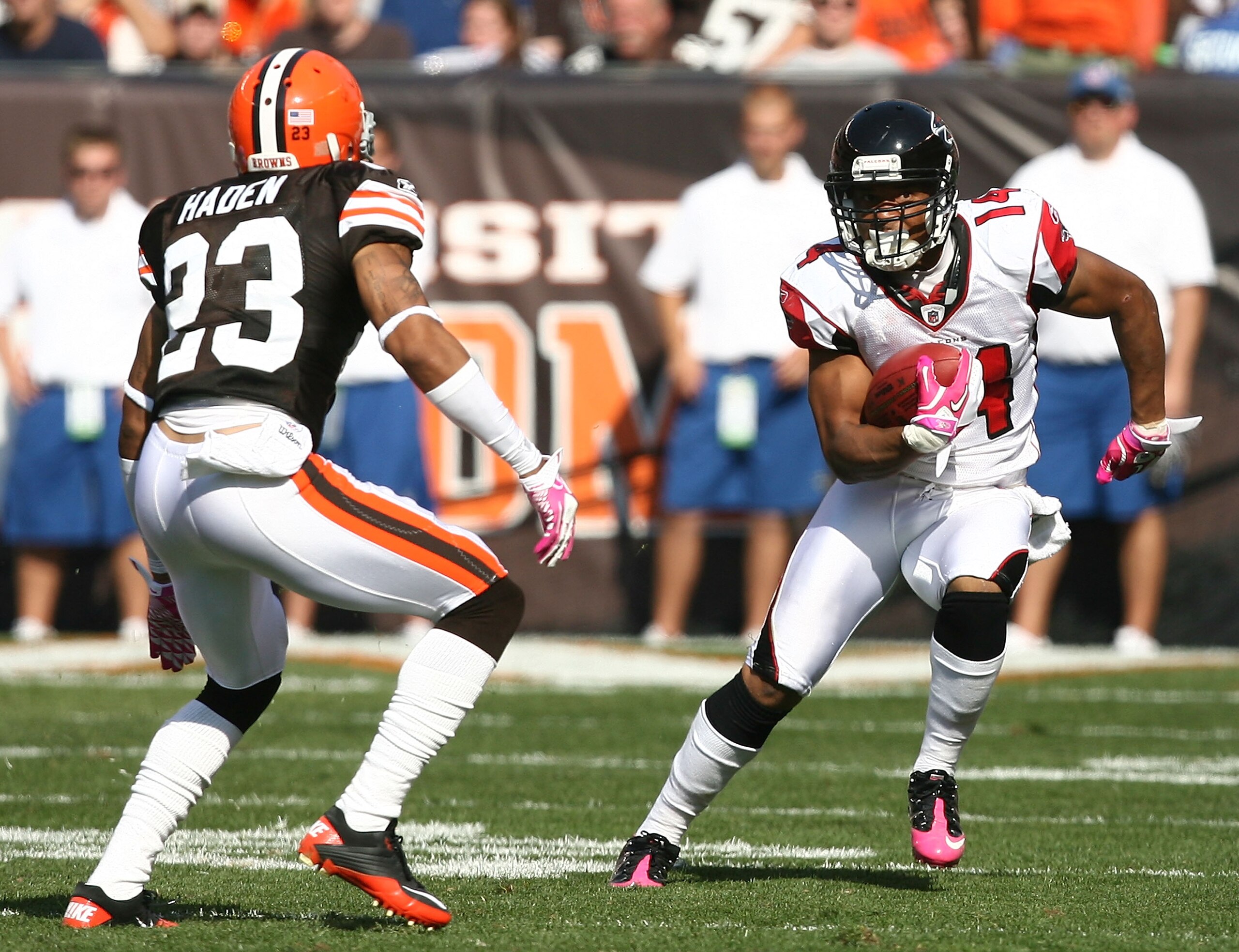 CLEVELAND - OCTOBER 10:  Wide receiver Eric Weems #14 of the Atlanta Falcons runs the ball by defensive back Joe Haden #23 of the Cleveland Browns at Cleveland Browns Stadium on October 10, 2010 in Cleveland, Ohio.  (Photo by Matt Sullivan/Getty Images)