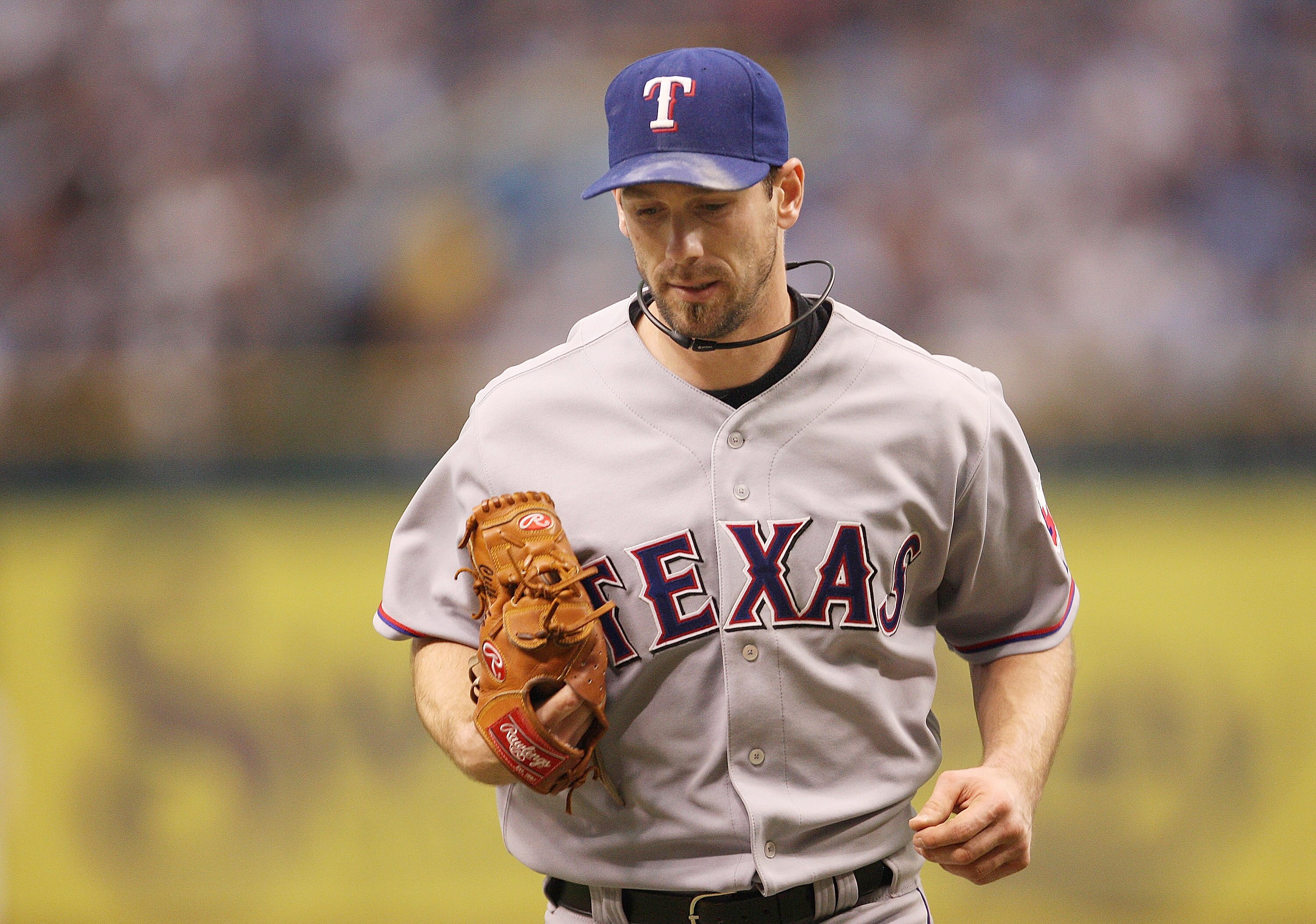 ST PETERSBURG, FL - OCTOBER 06:  6: Cliff Lee #33 of the Texas Rangers jogs off the mound during Game 1 of the ALDS against the Tampa Bay Rays at Tropicana Field on October 6, 2010 in St. Petersburg, Florida.  (Photo by Mike Ehrmann/Getty Images)
