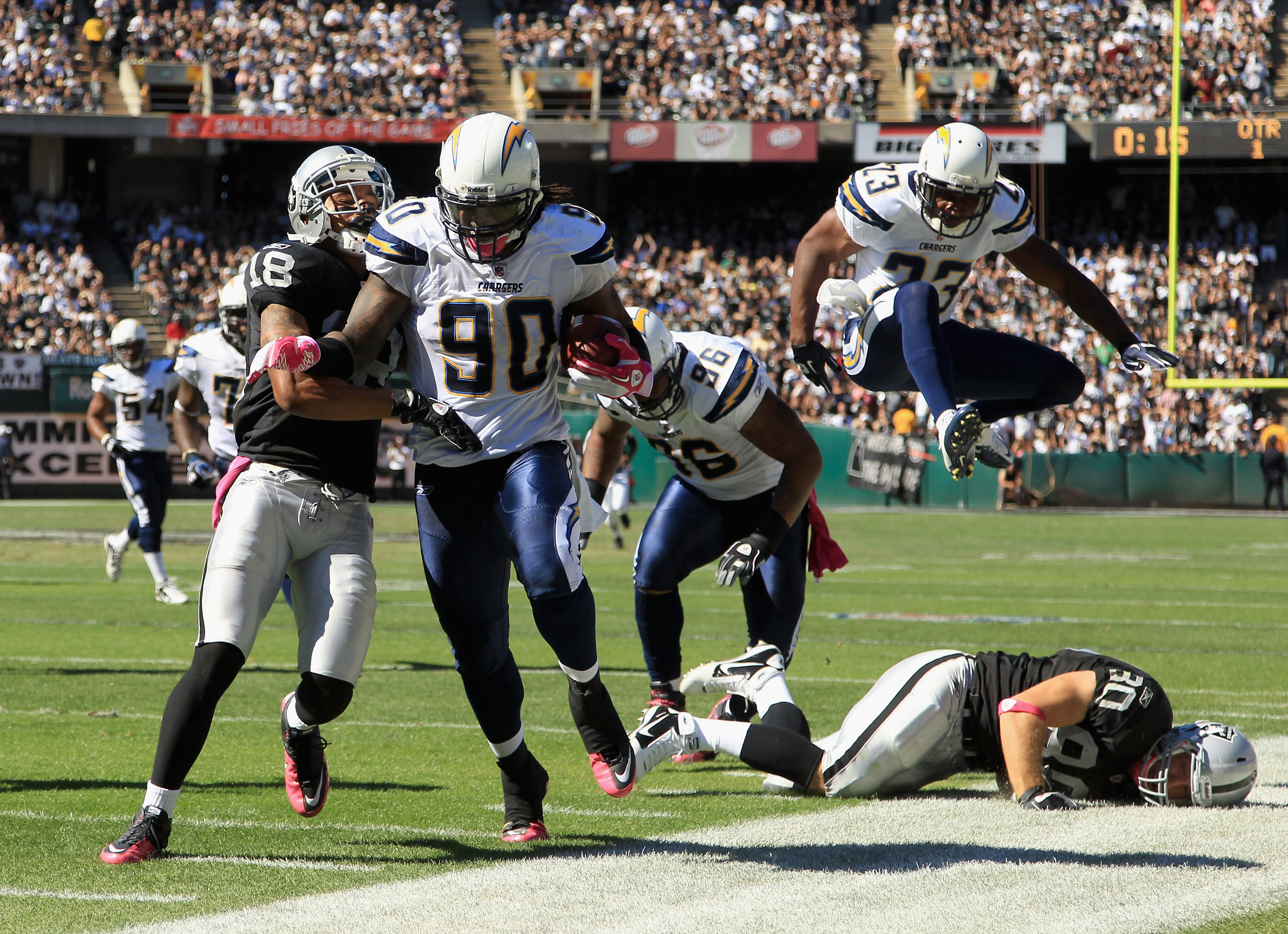 OAKLAND, CA - OCTOBER 10: Antwan Applewhite #90 of the San Diego Chargers returns a fumble by the Oakland Raiders at Oakland-Alameda County Coliseum on October 10, 2010 in Oakland, California. Upon further review, the fumble was ruled an incomplete pass OAKLAND, CA - OCTOBER 10: Antwan Applewhite #90 of the San Diego Chargers returns a fumble by the Oakland Raiders at Oakland-Alameda County Coliseum on October 10, 2010 in Oakland, California. Upon further review, the fumble was ruled an incomplete pass