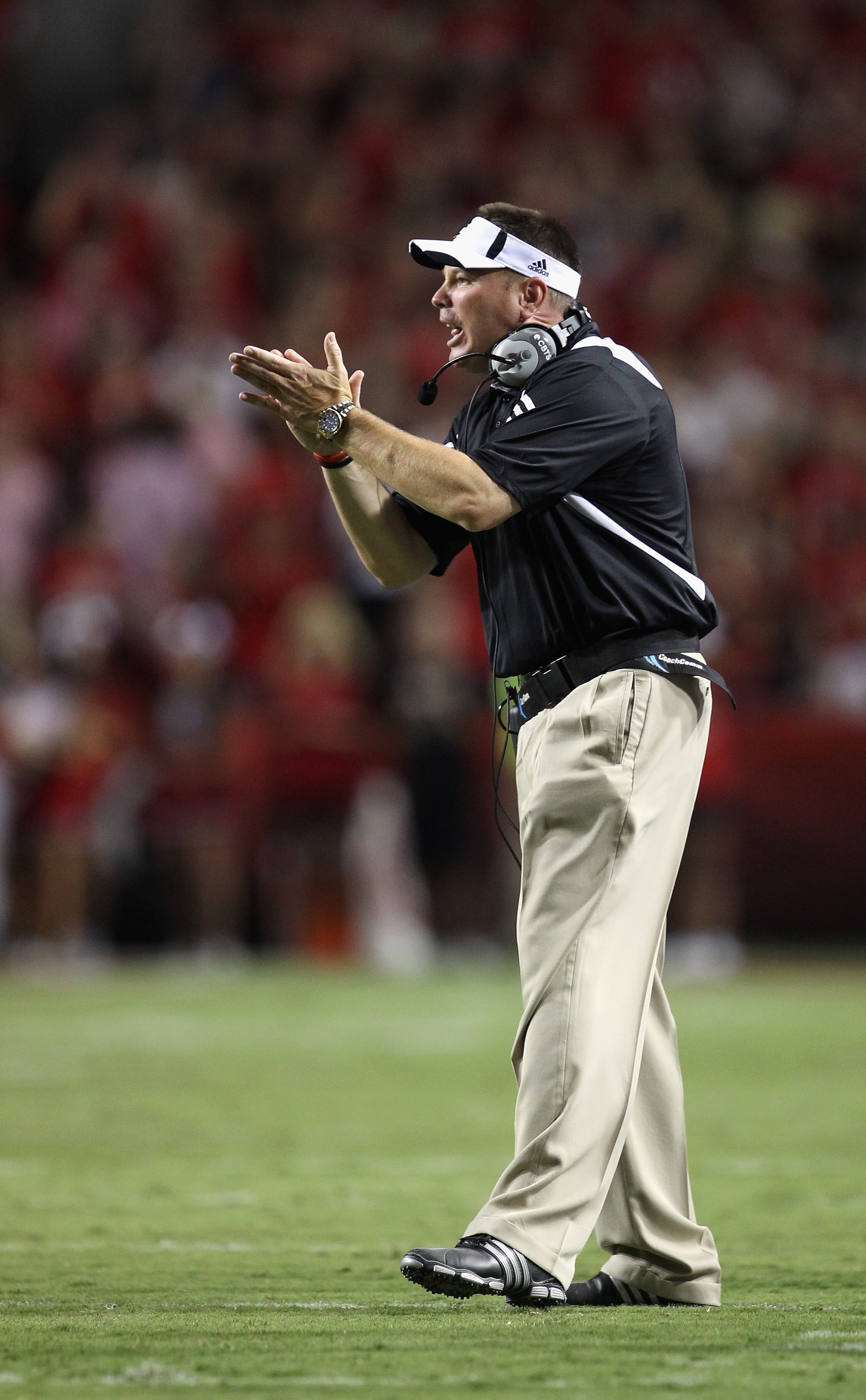 RALEIGH, NC - SEPTEMBER 16:  Head coach Butch Jones of the Cincinnati Bearcats yells at his team against the North Carolina State Wolfpack during their game at Carter-Finley Stadium on September 16, 2010 in Raleigh, North Carolina.  (Photo by Streeter Lec