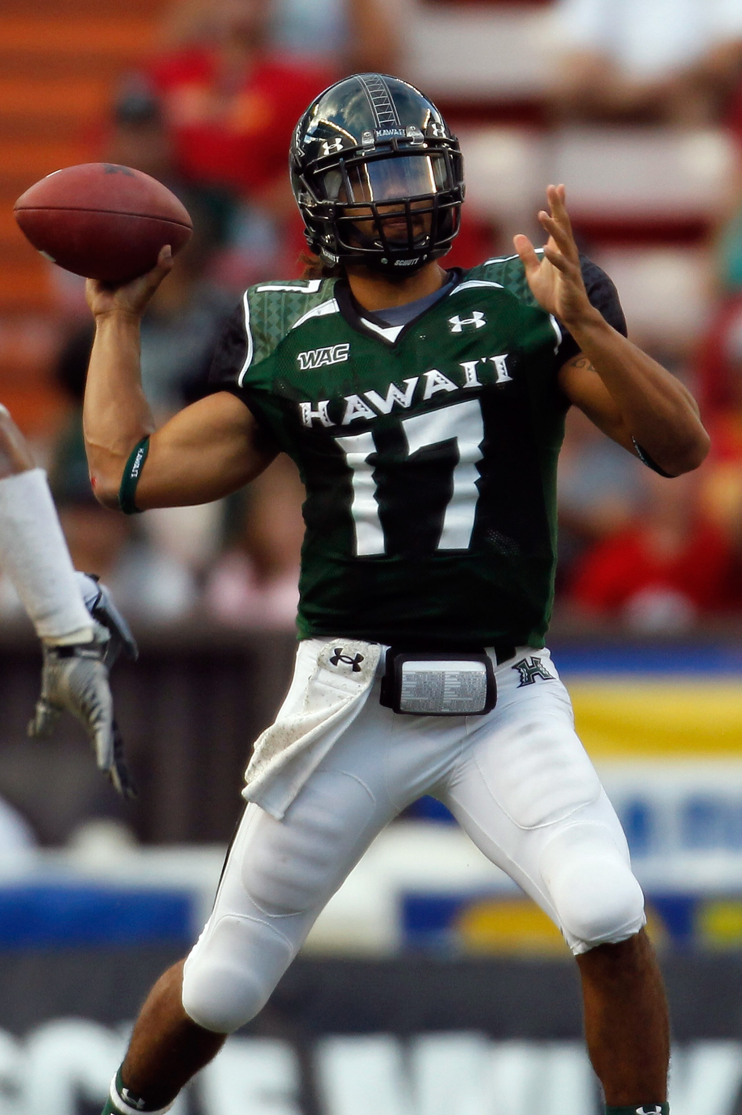 HONOLULU - SEPTEMBER 2: Quarterback Bryant Moniz #17 of the University of Hawaii Warriors makes a pass against the University of Southern California Trojans during first half action at Aloha Stadium September 2, 2010 in Honolulu, Hawaii. (Photo by Kent N HONOLULU - SEPTEMBER 2: Quarterback Bryant Moniz #17 of the University of Hawaii Warriors makes a pass against the University of Southern California Trojans during first half action at Aloha Stadium September 2, 2010 in Honolulu, Hawaii. (Photo by Kent N