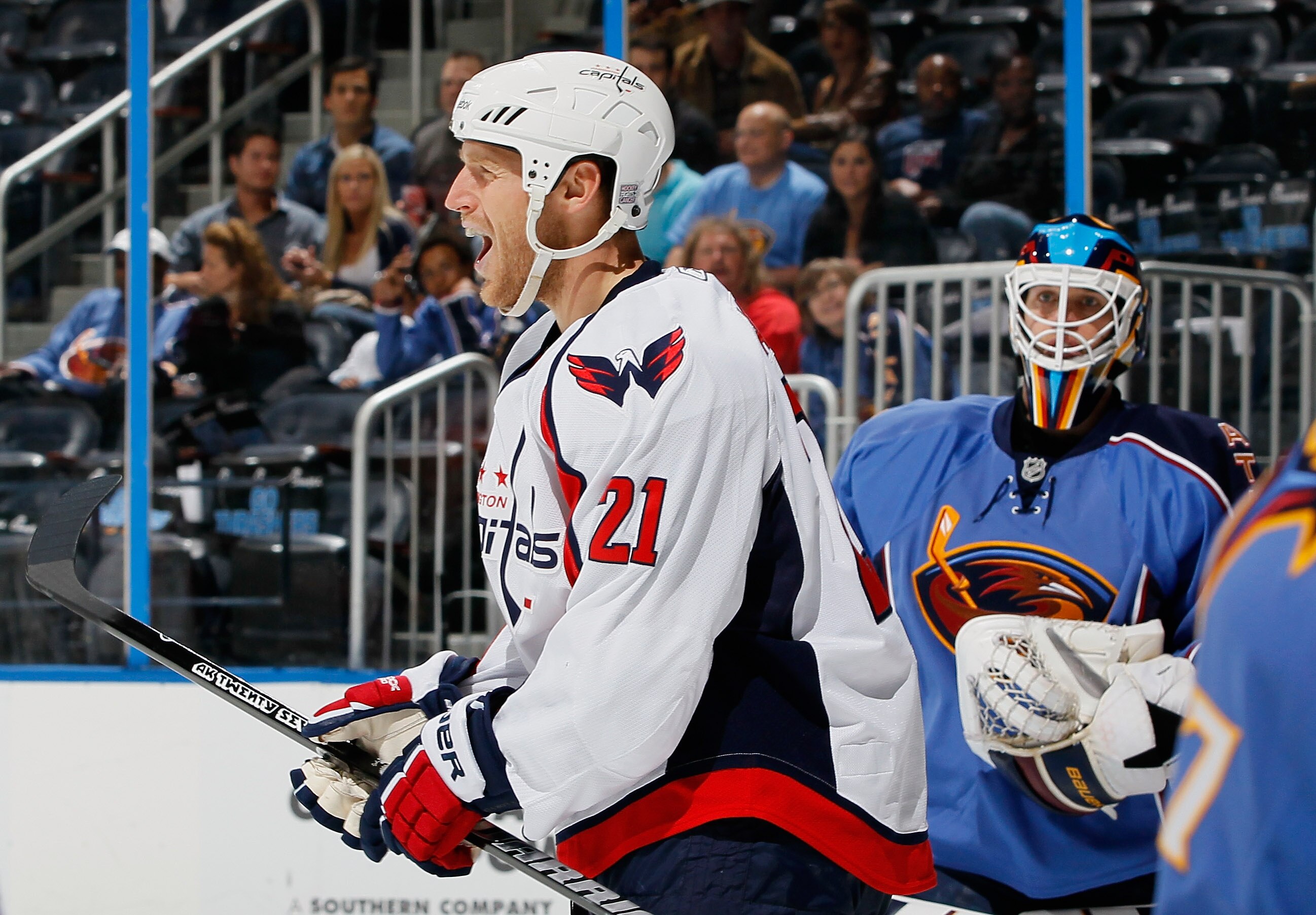 ATLANTA - OCTOBER 08:  Brooks Laich #21 of the Washington Capitals reacts after scoring a goal against goaltender Chris Mason #50 of the Atlanta Thrashers at Philips Arena on October 8, 2010 in Atlanta, Georgia.  (Photo by Kevin C. Cox/Getty Images)